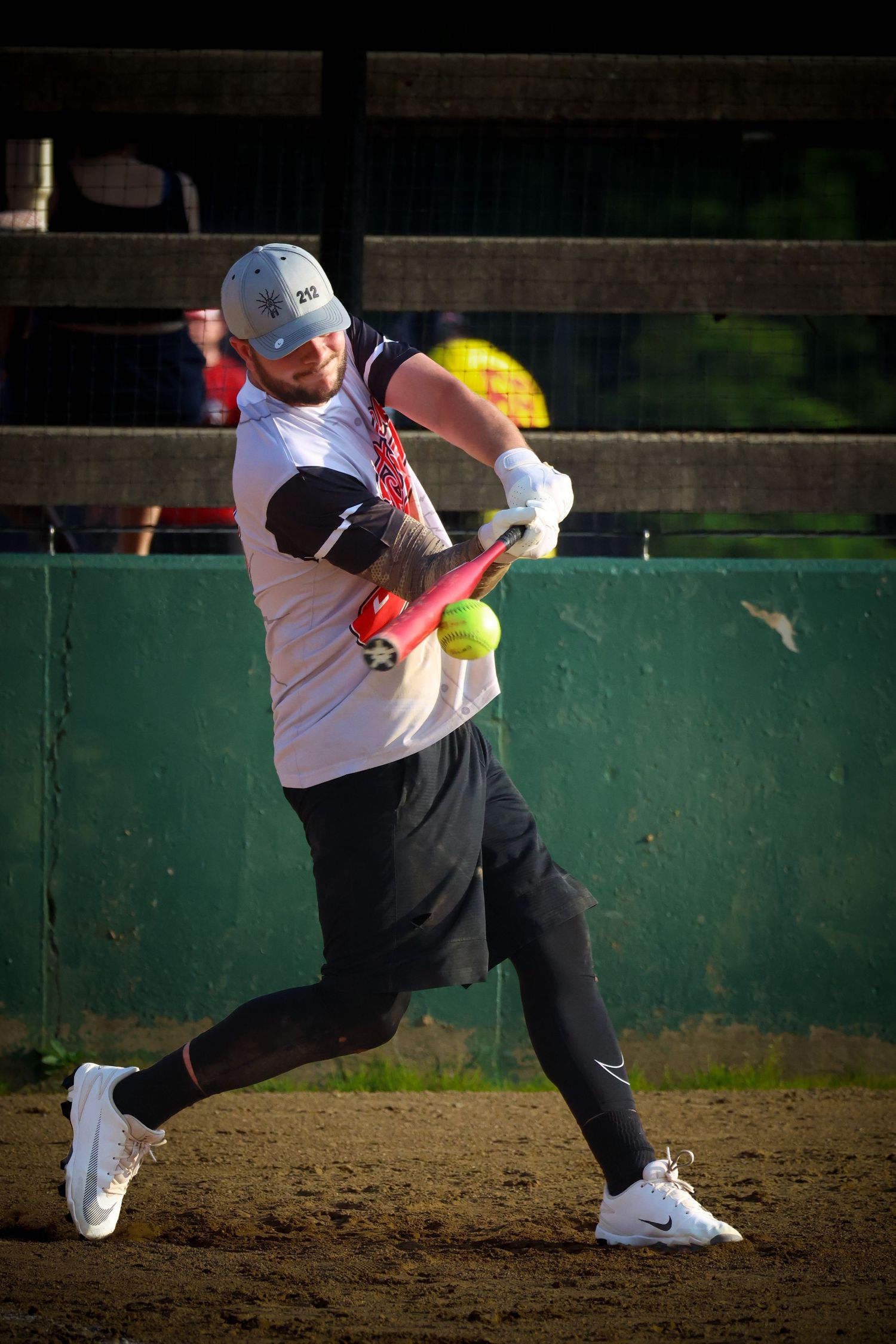 Sports photo, baseball batter hitting the ball