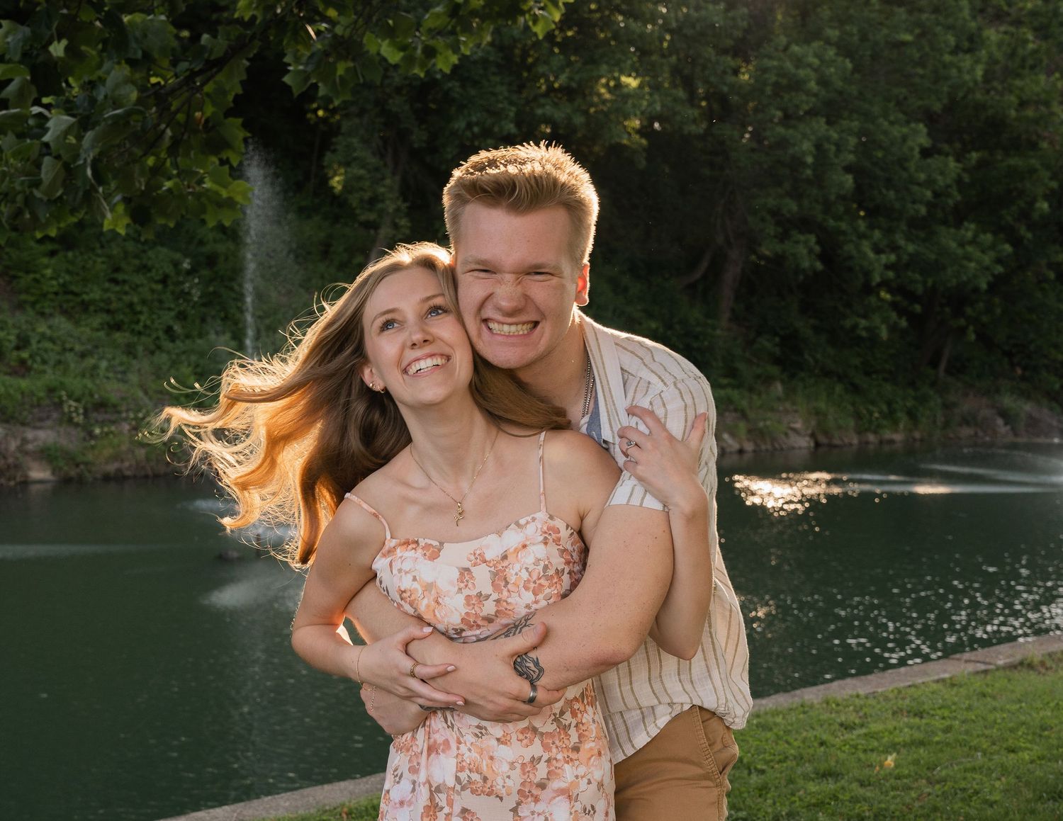 ©AnnaVonRiesenPhotography Couples Photography | Color image of a couple smiling and holding eachother.