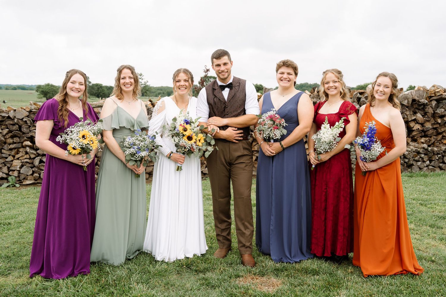 ©AnnaVonRiesenPhotography Wedding Photography | Color image of the bridesmaids with the bride & groom.