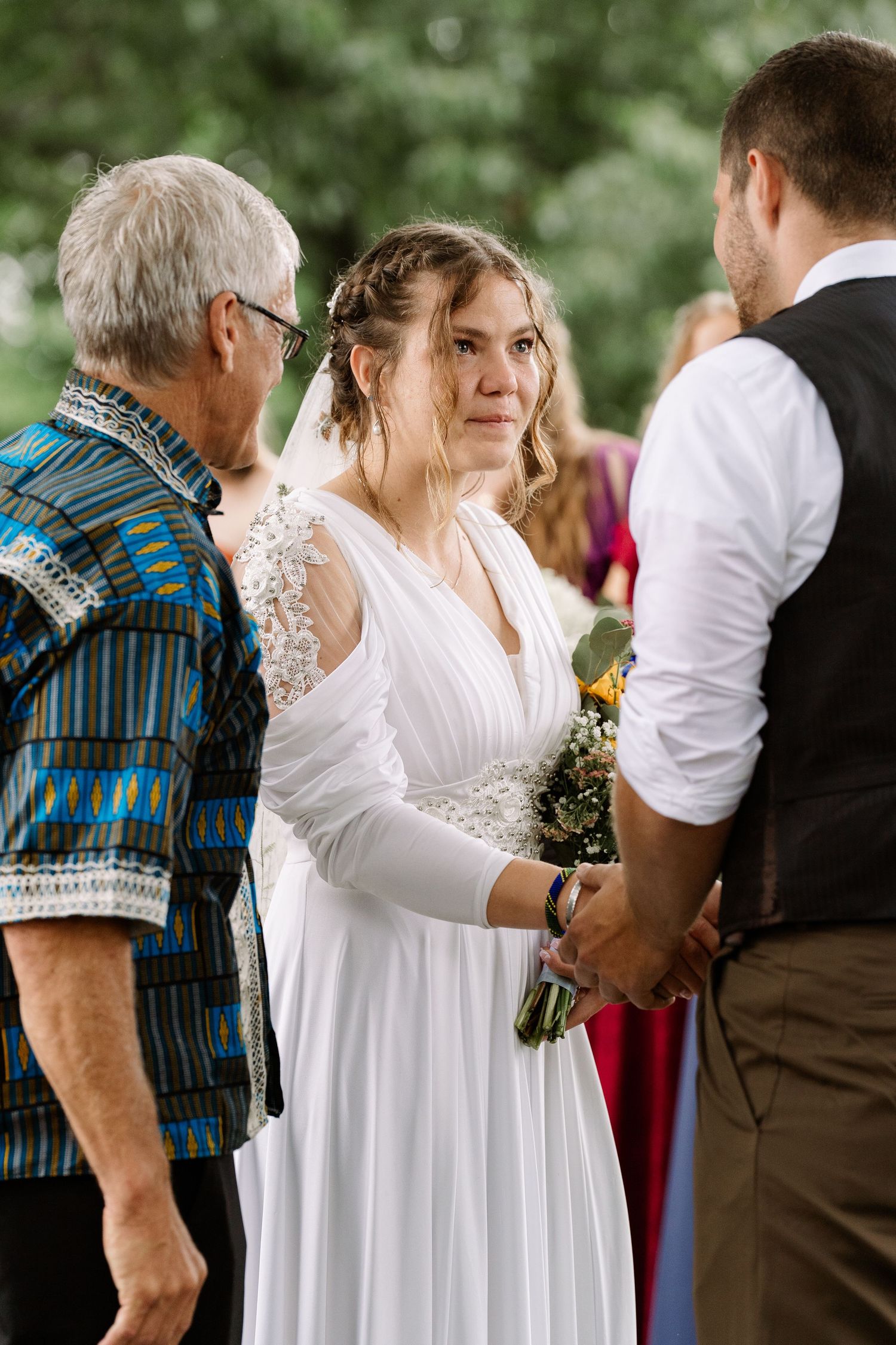 ©AnnaVonRiesenPhotography Wedding Photography | Color image of the bride looking at her groom.