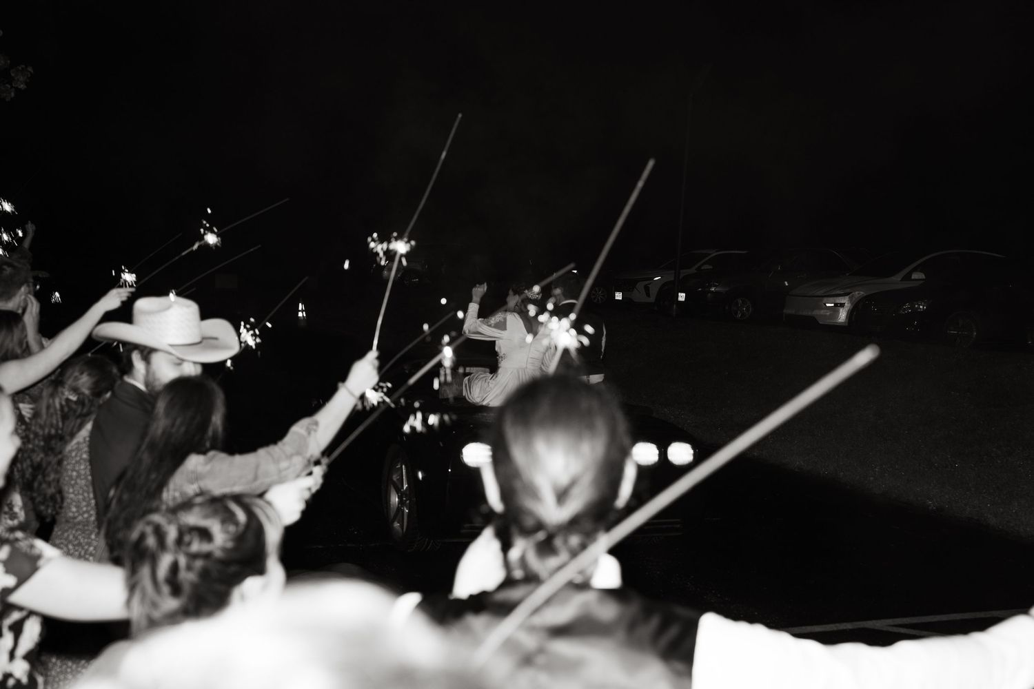 ©AnnaVonRiesenPhotography Wedding Photography | B&W image of the sparklers at the end of the send off.