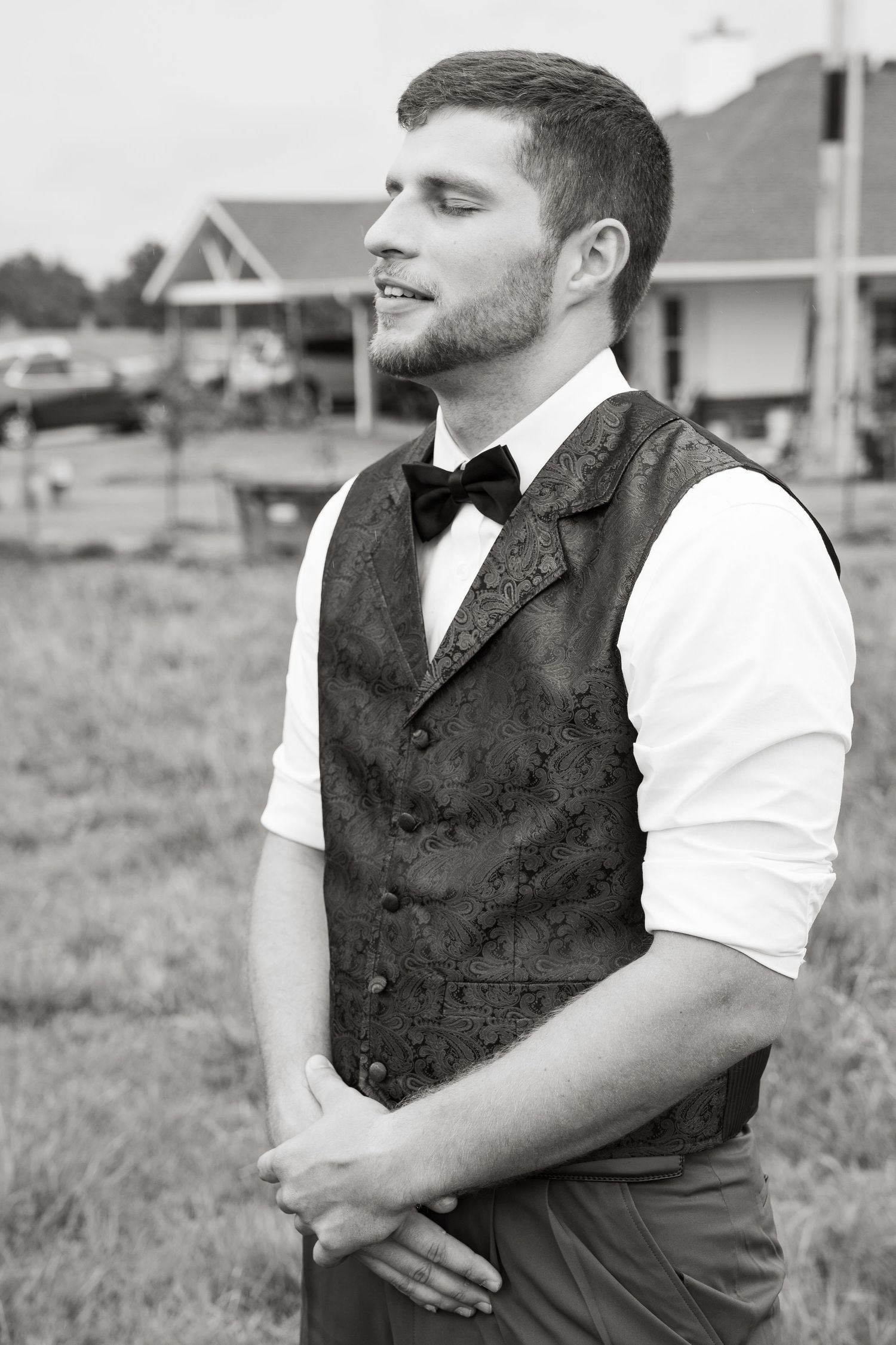 ©AnnaVonRiesenPhotography Wedding Photography | B&W image of the groom closing his eyes waiting for his bride.