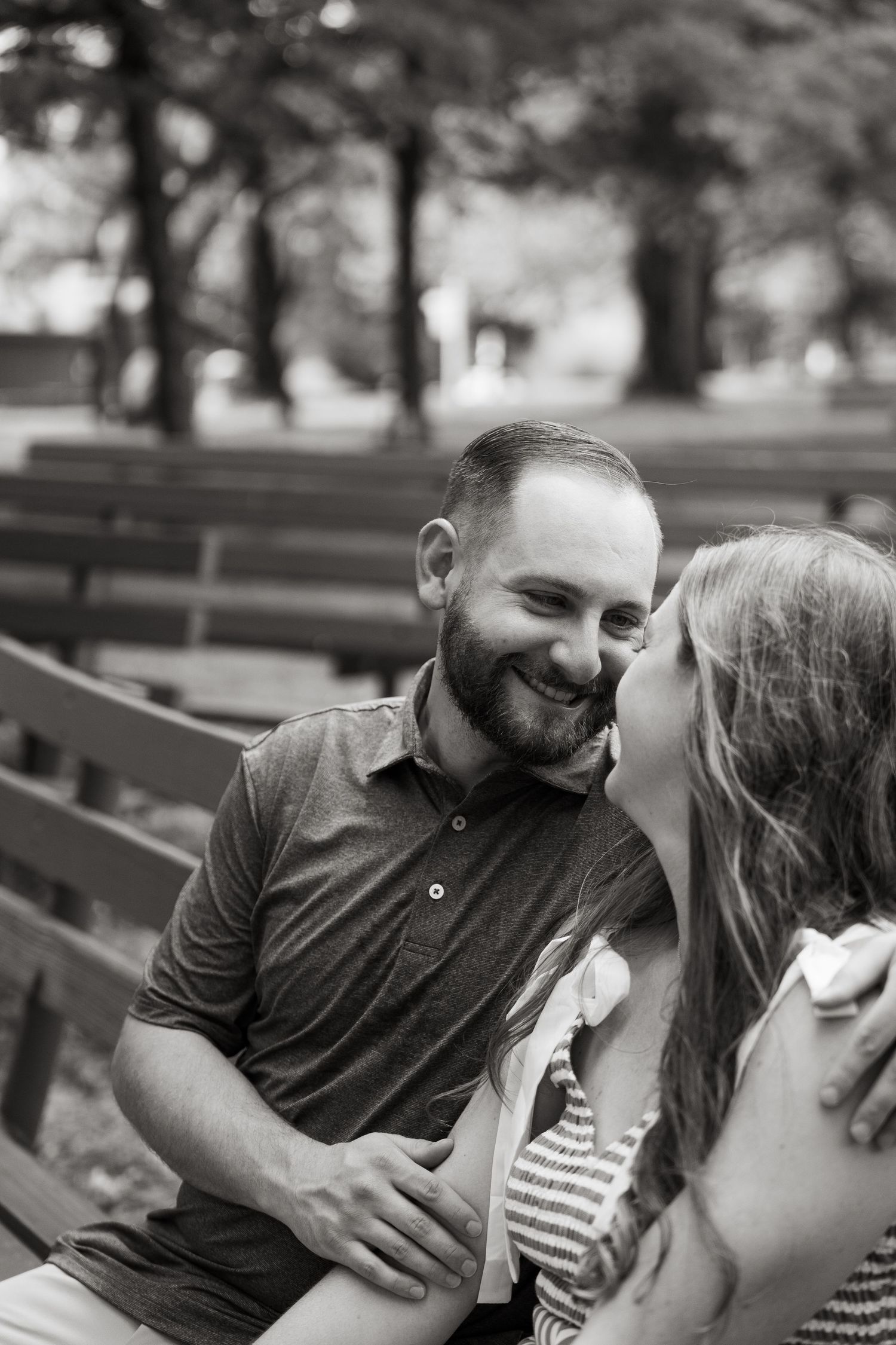©AnnaVonRiesenPhotography Engagement Photography | B&W image of a couple laughing together.