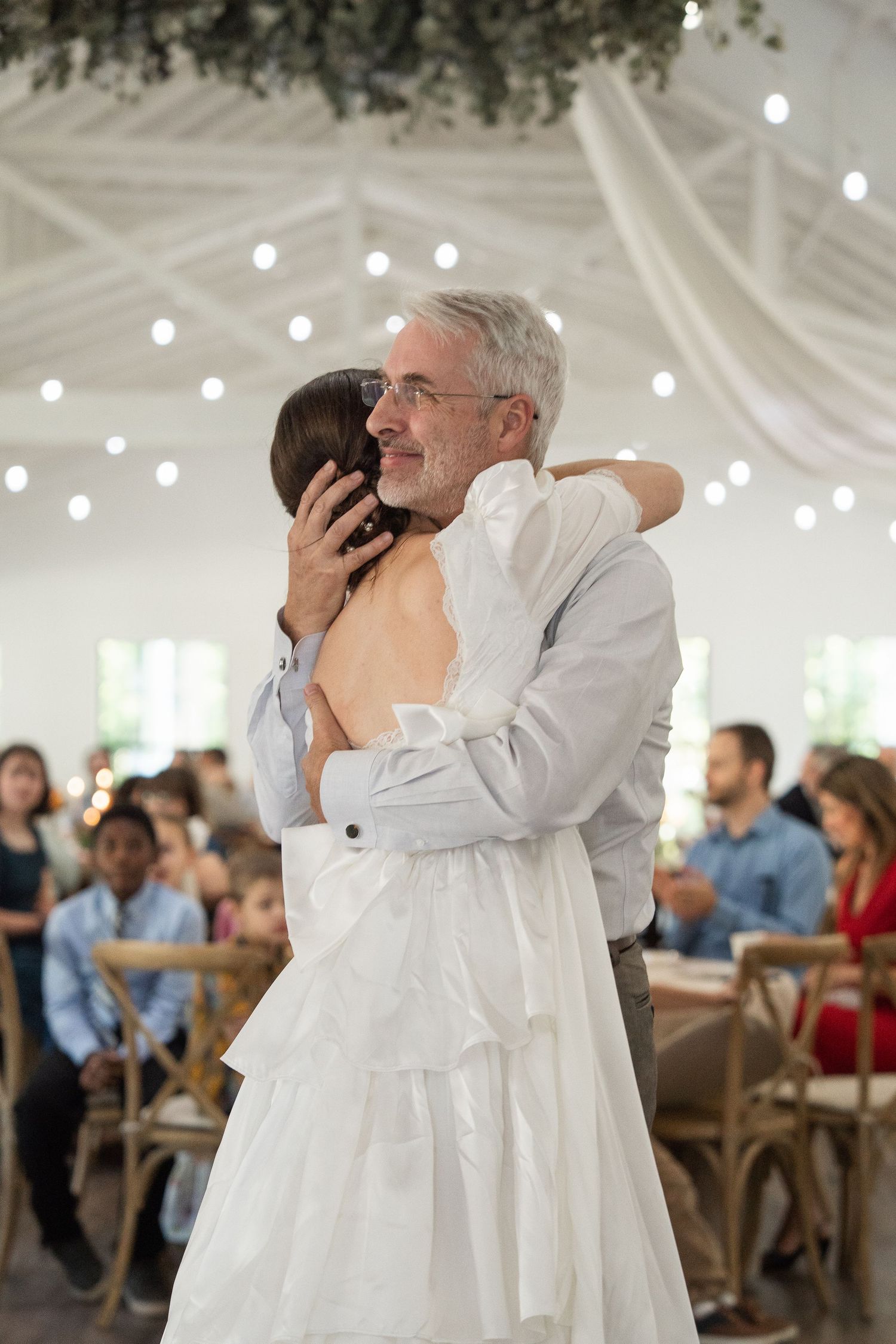 ©AnnaVonRiesenPhotography Wedding Photography | Color image of the bride dancing with her dad.