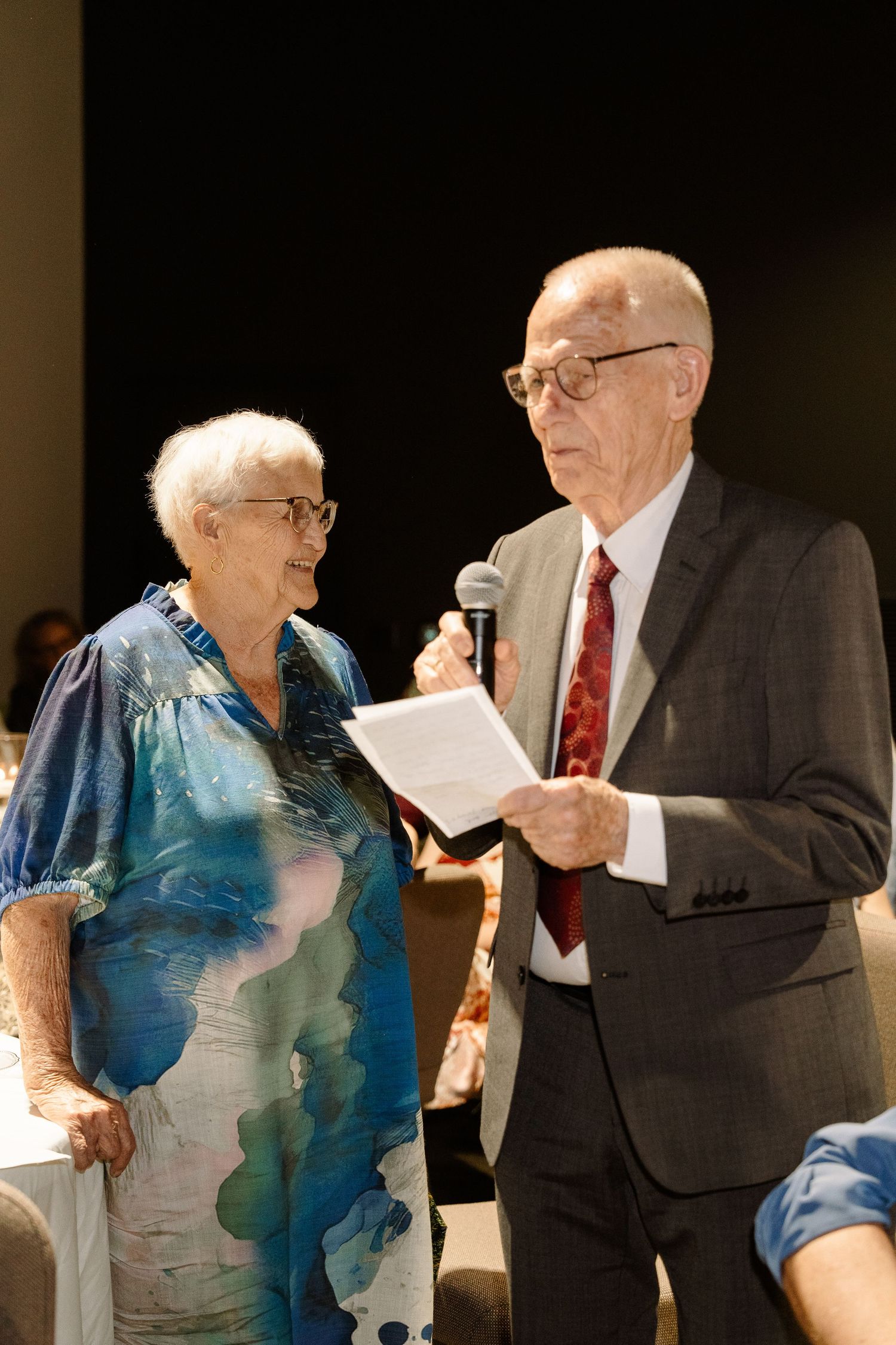 ©AnnaVonRiesenPhotography Wedding Photography | Color image of the bride's grandparents giving a speech.