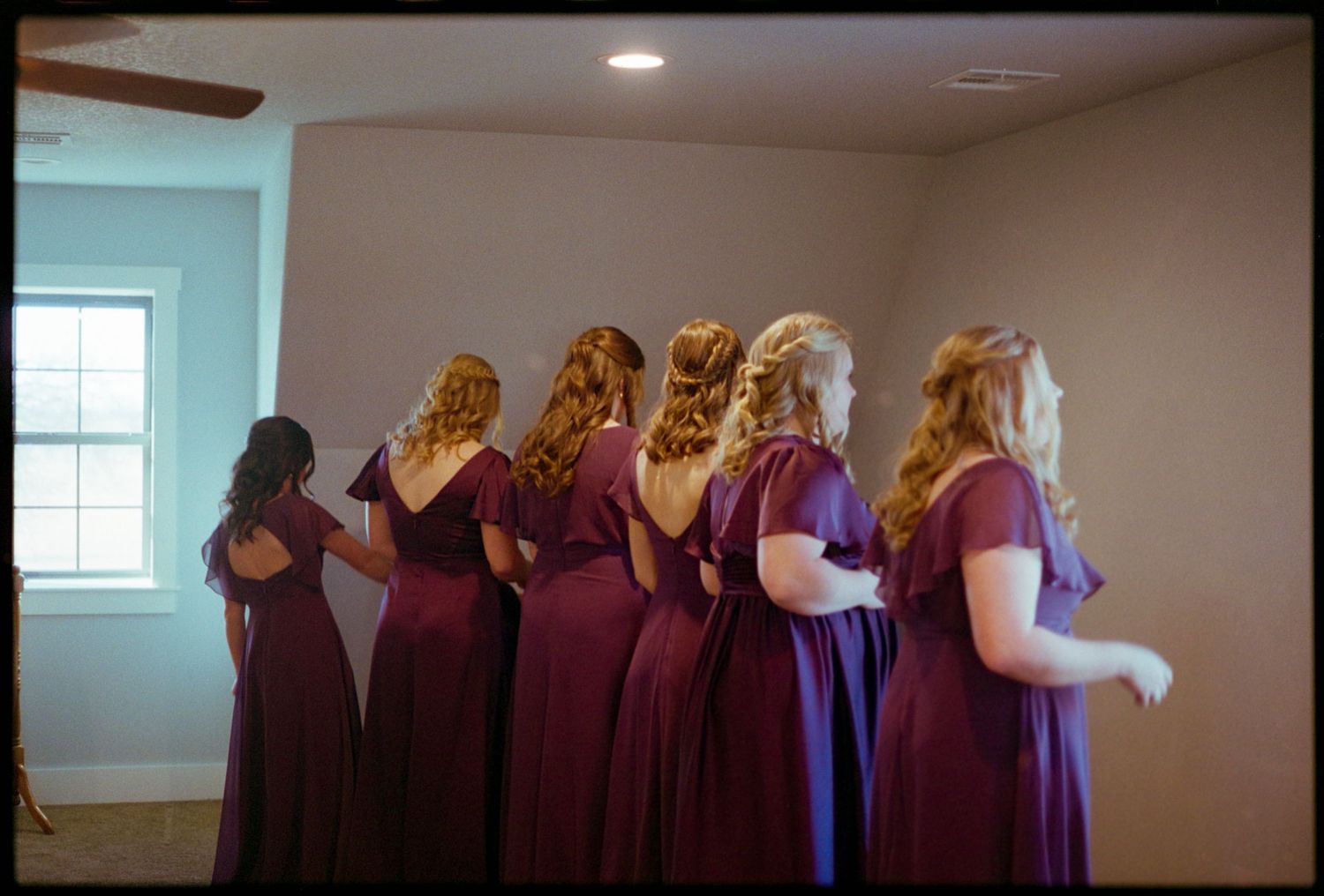 ©AnnaVonRiesenPhotography Wedding Photography | Film Color image of the bridesmaids waiting for a first look with the bride.