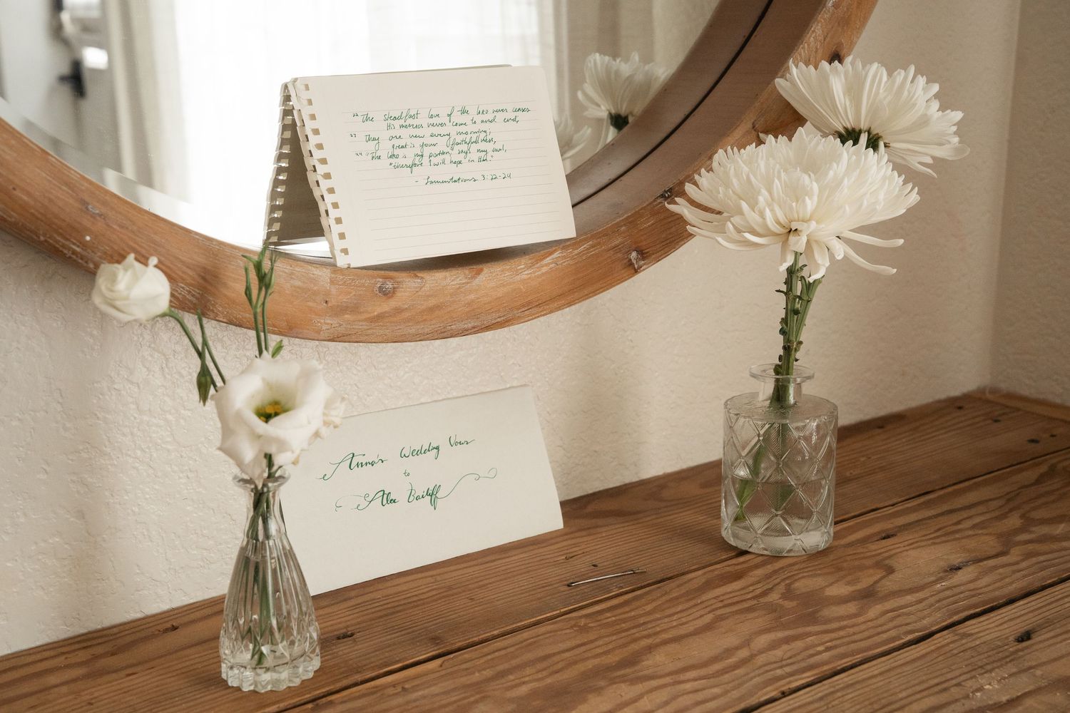 ©AnnaVonRiesenPhotography Wedding Photography | Color image of the bride's vows sitting at her getting ready station.
