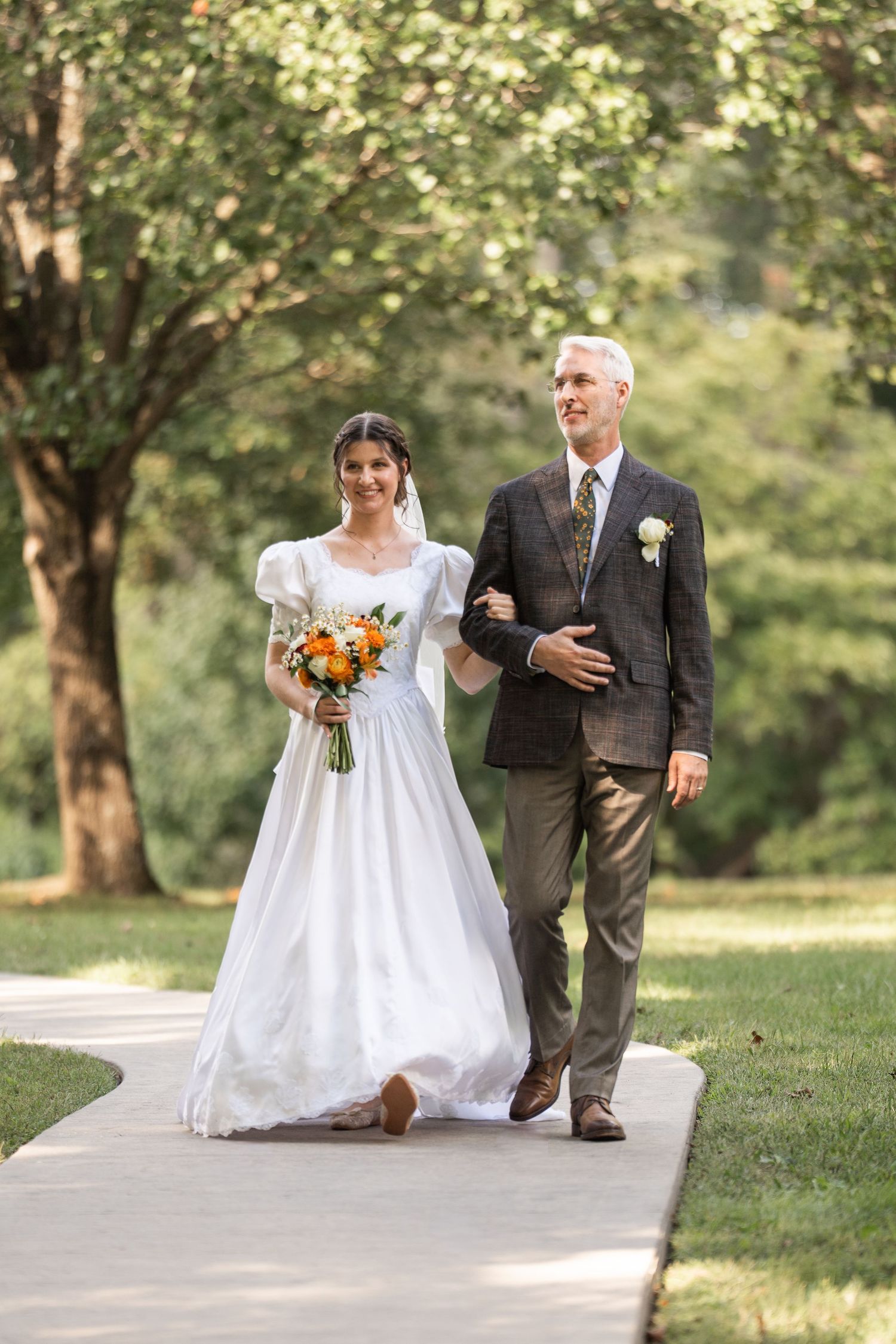©AnnaVonRiesenPhotography Wedding Photography | Color image of the bride and FOB smiling, arm in arm.