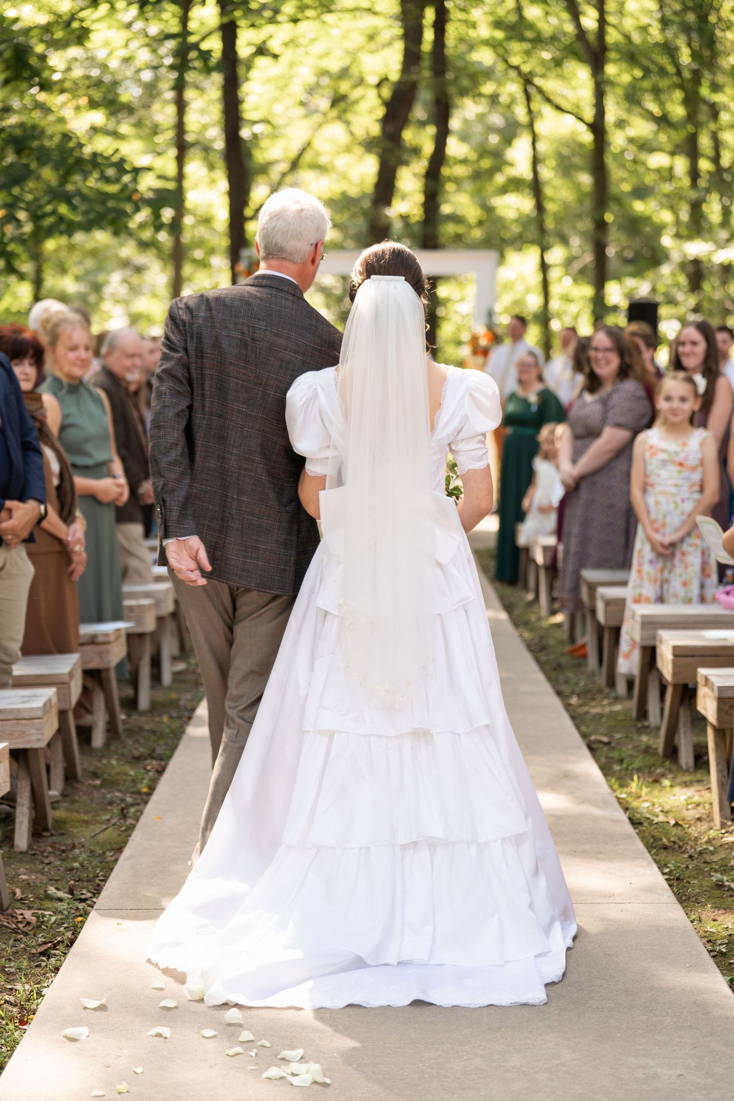 ©AnnaVonRiesenPhotography Wedding Photography | Color image of the father of the bride walking his daughter down the aisle.