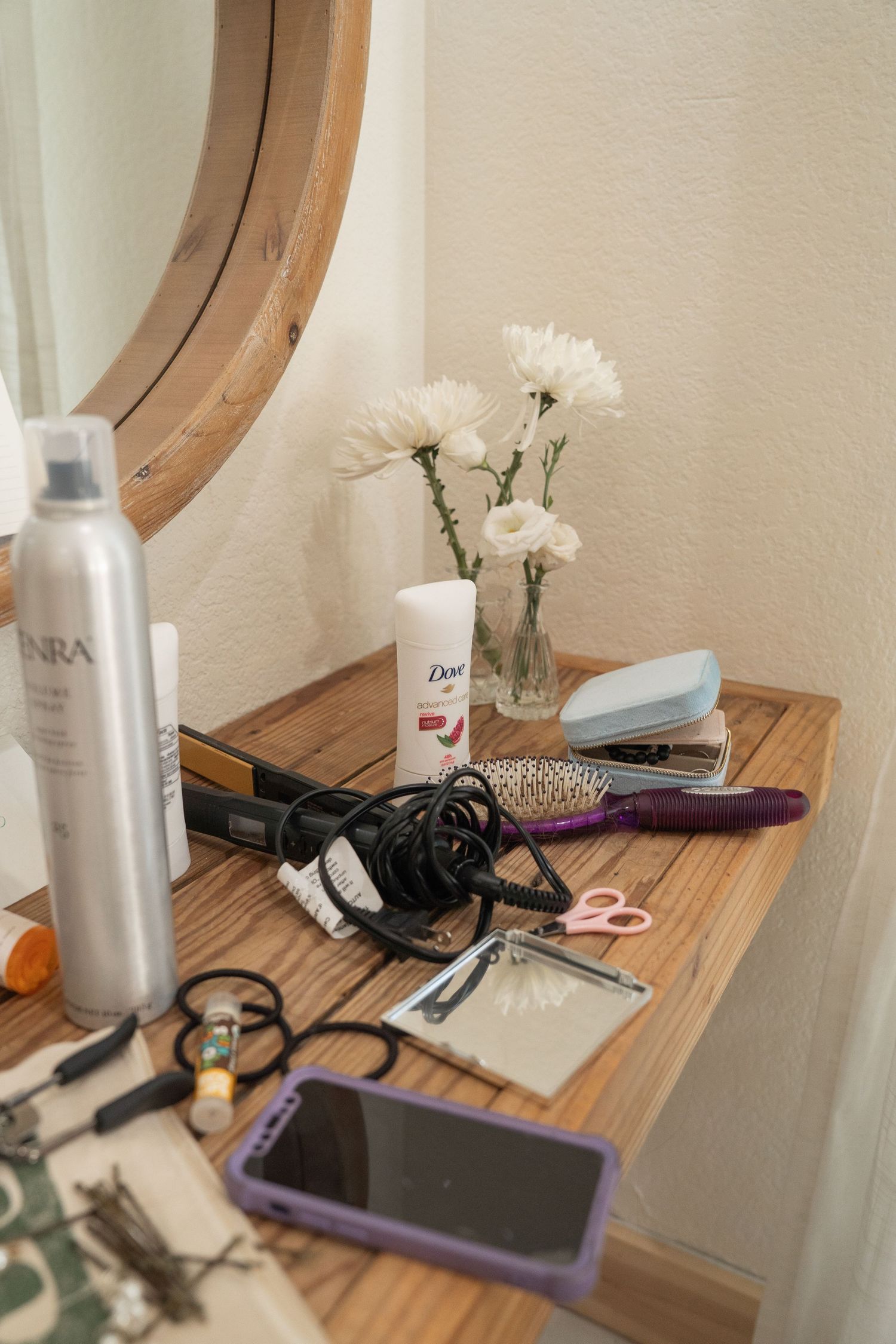©AnnaVonRiesenPhotography Wedding Photography | Color image of a cluttered getting ready station.