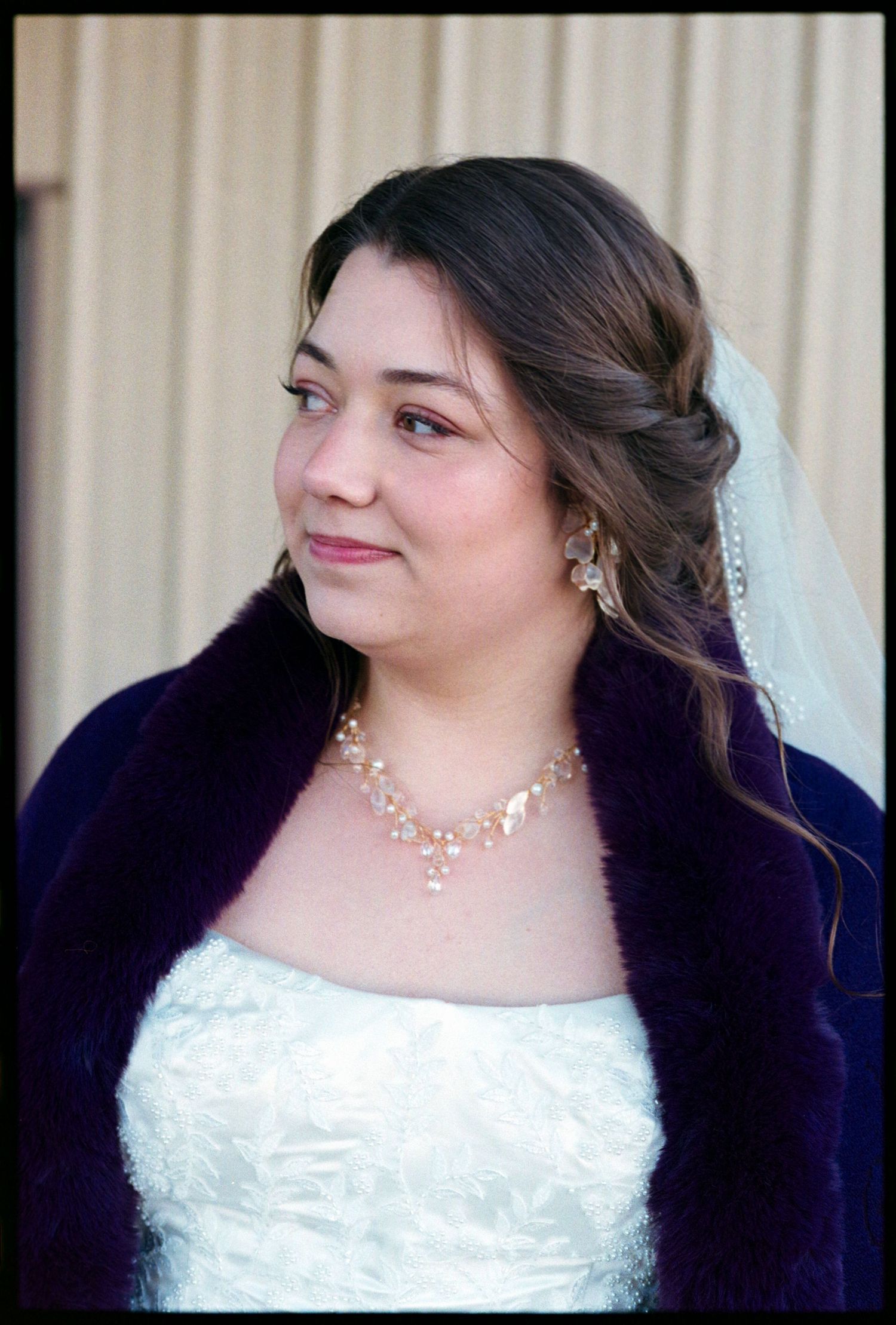 ©AnnaVonRiesenPhotography Wedding Photography | Film Color image of the bride smiling.