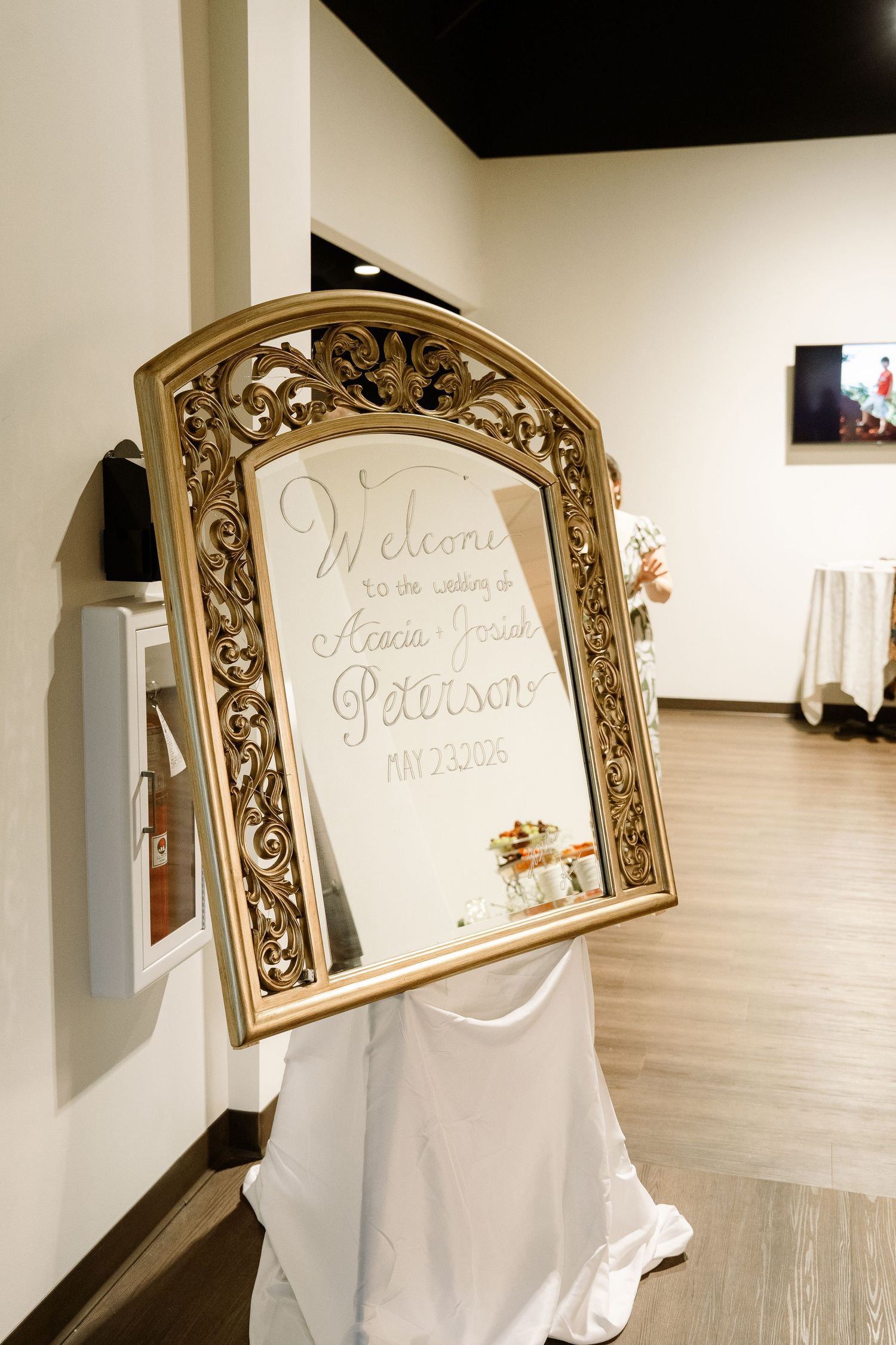 ©AnnaVonRiesenPhotography Wedding Photography | Color image of the welcome sign at the reception venue.