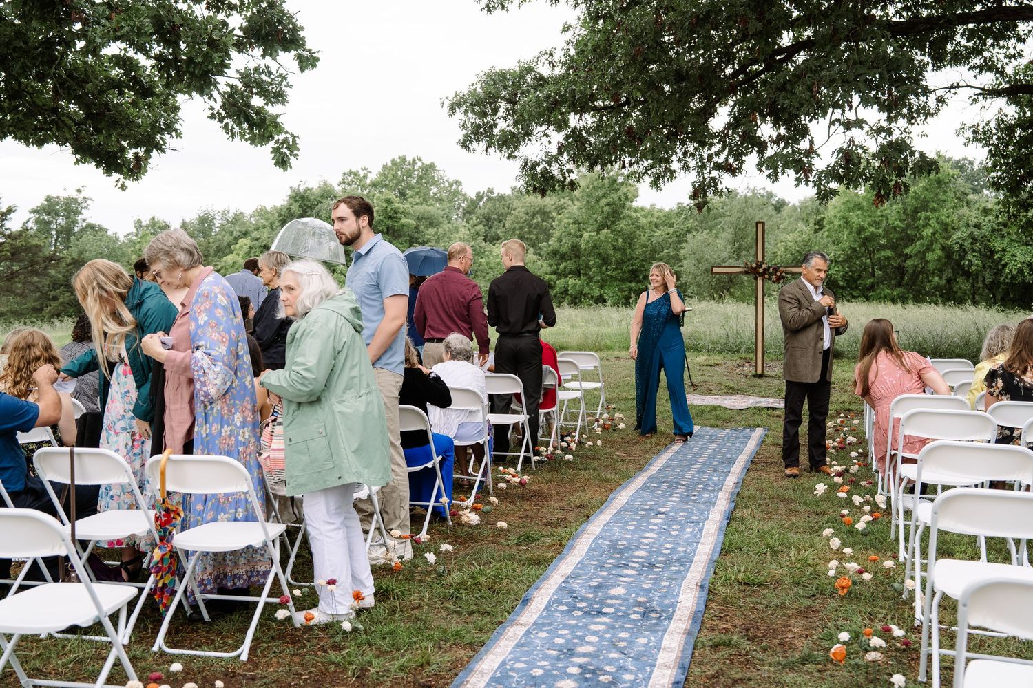 ©AnnaVonRiesenPhotography Wedding Photography | Color image of guests arriving to their seats.
