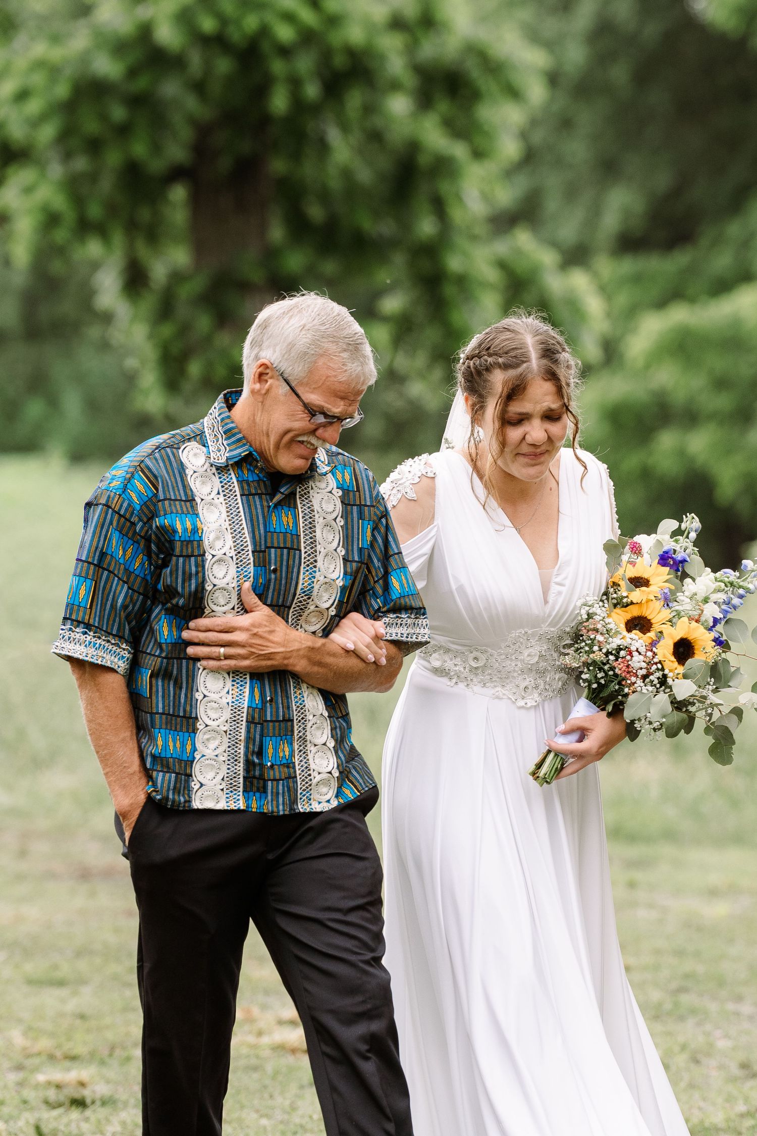 ©AnnaVonRiesenPhotography Wedding Photography | Color image of the bride & her father walking down the aisle.