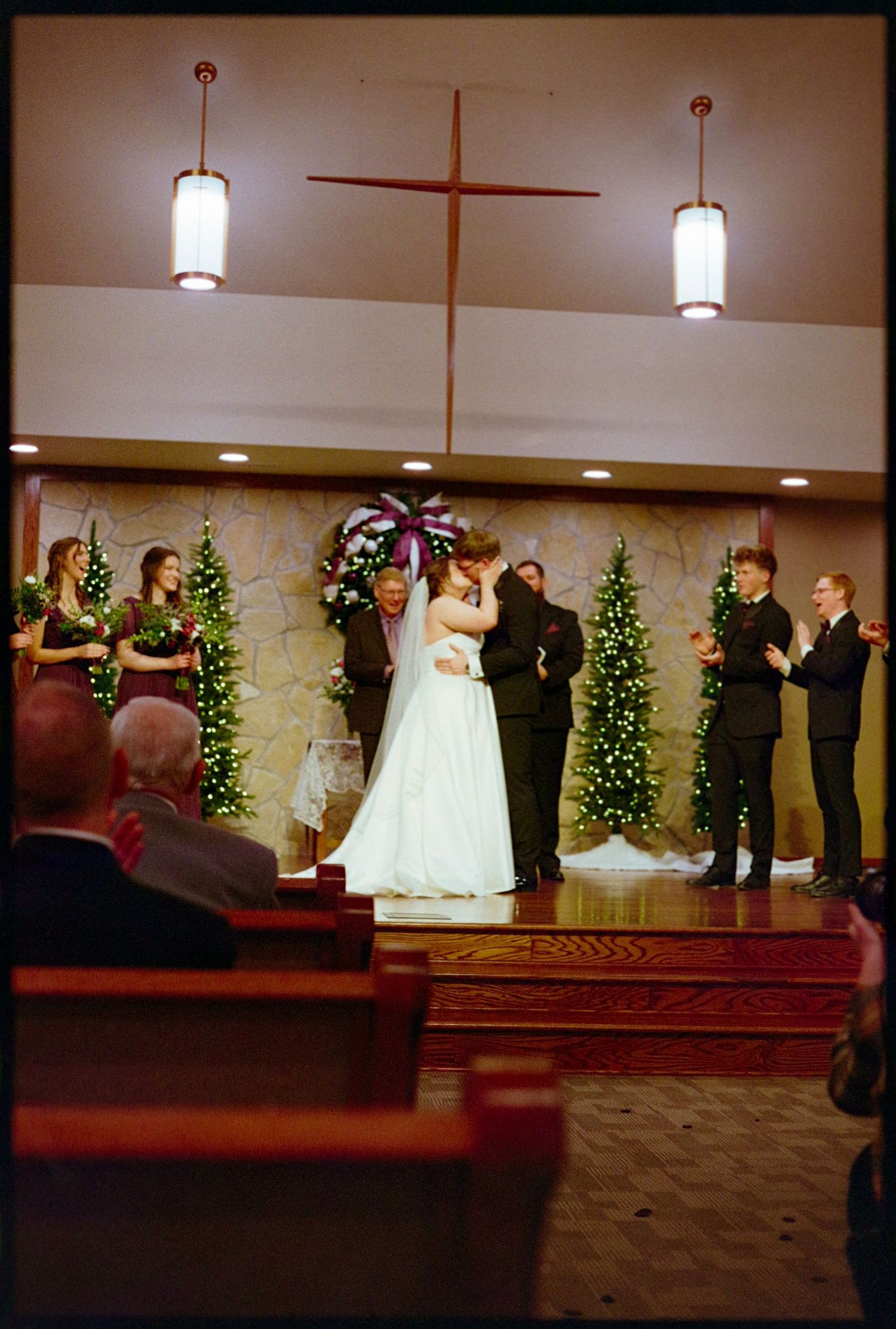 ©AnnaVonRiesenPhotography Wedding Photography | Film Color image of the bride & groom's first kiss.