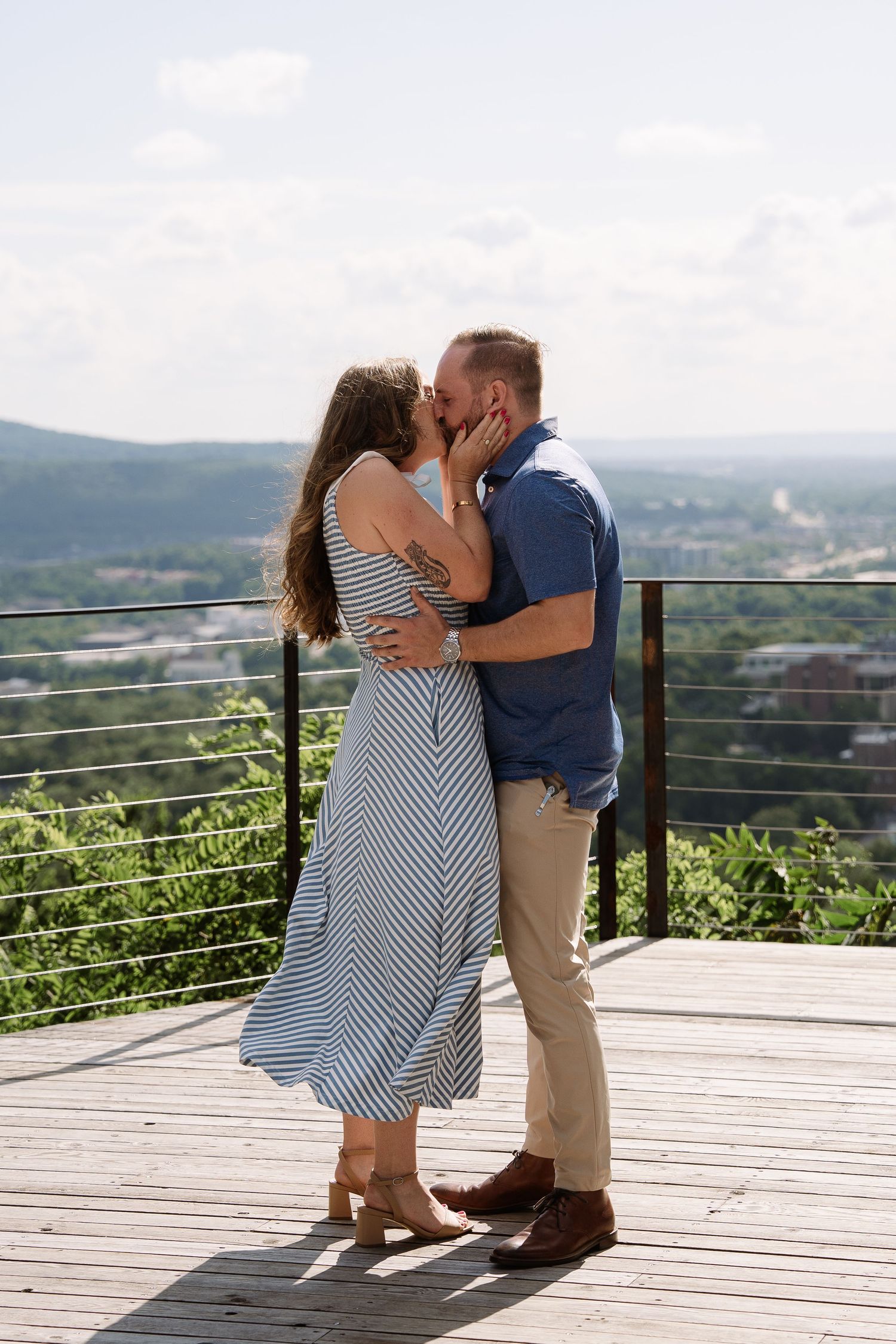 ©AnnaVonRiesenPhotography Engagement Photography | Color image of a couple kissing after getting engaged.