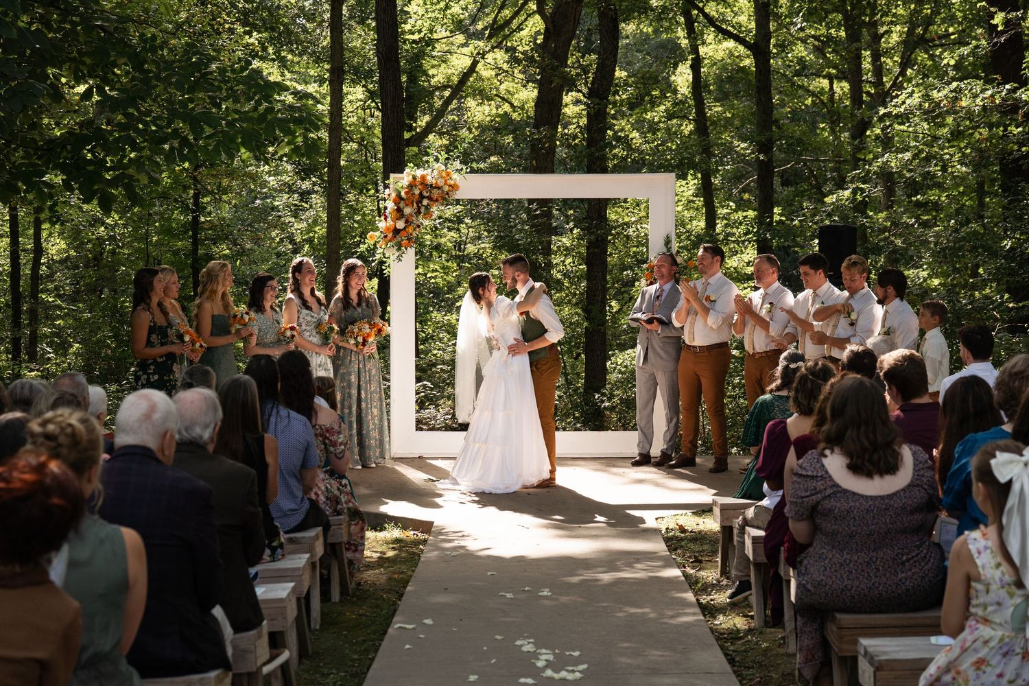 ©AnnaVonRiesenPhotography Wedding Photography | Color image of the bride & groom at the altar after the first kiss.