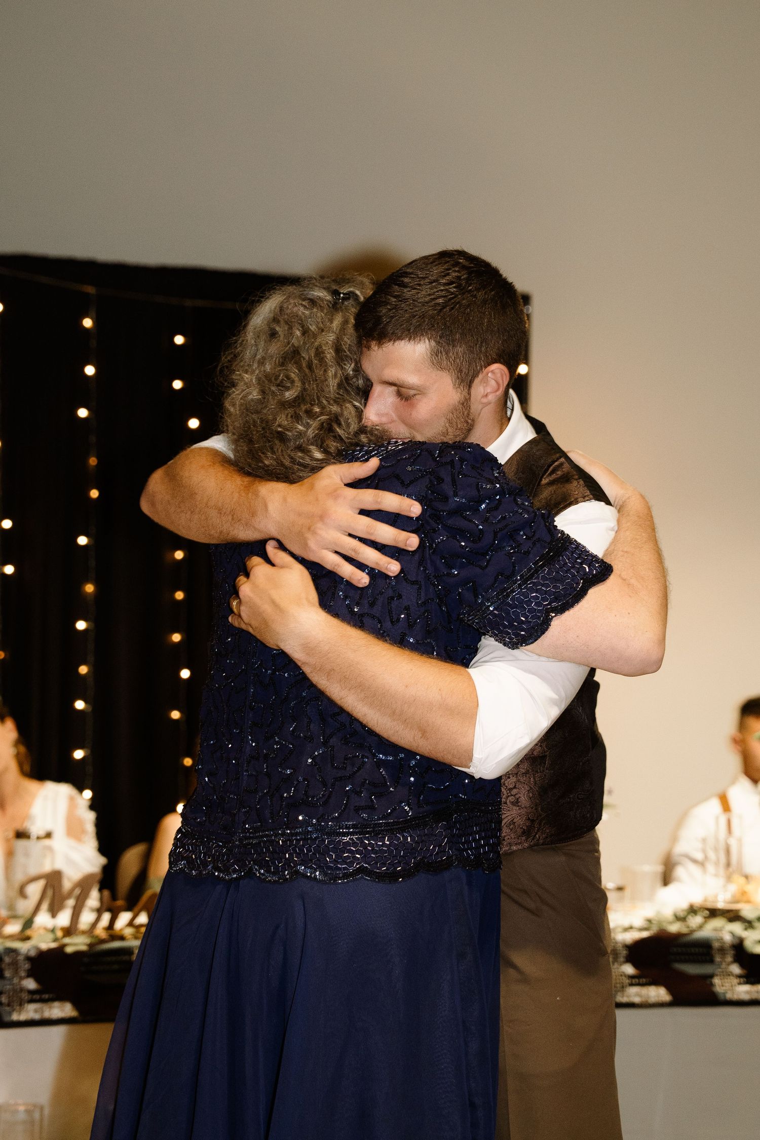 ©AnnaVonRiesenPhotography Wedding Photography | Color image of the groom dancing with his mom.