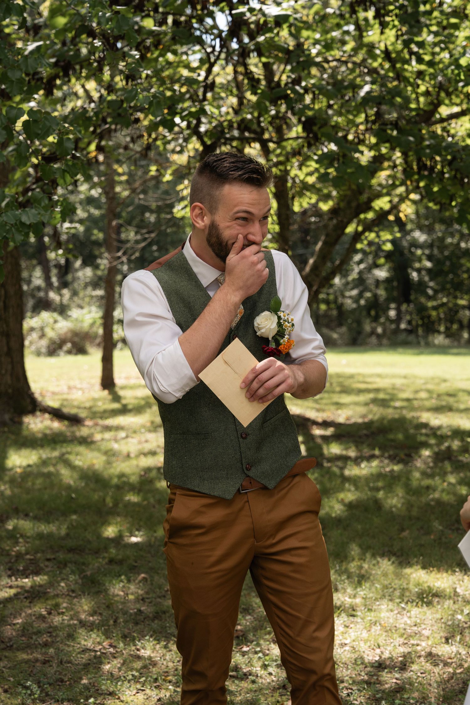 ©AnnaVonRiesenPhotography Wedding Photography | Color image of the groom reacting to his bride during their first look.