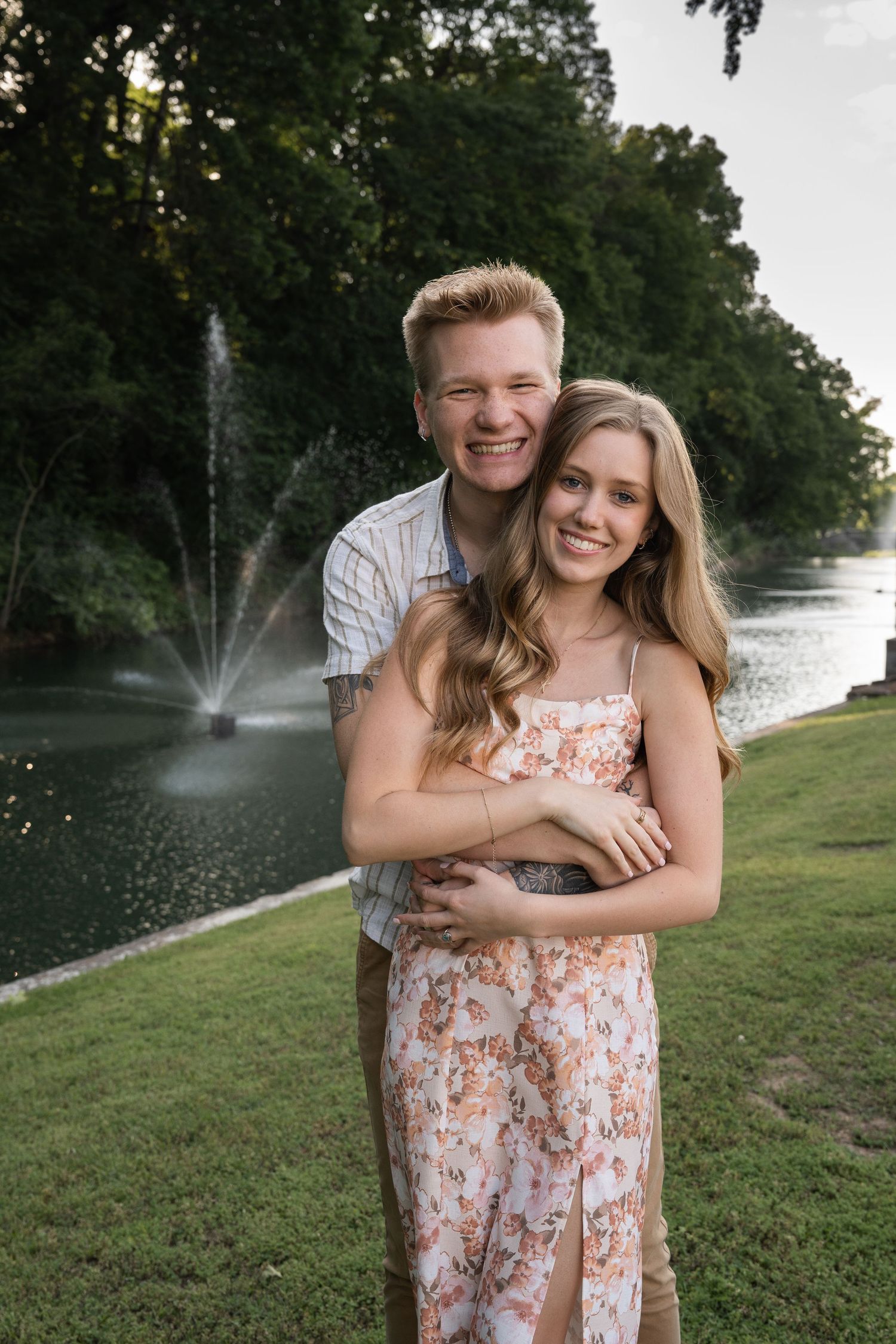©AnnaVonRiesenPhotography Couples Photography | Color image of a couple smiling and holding eachother.