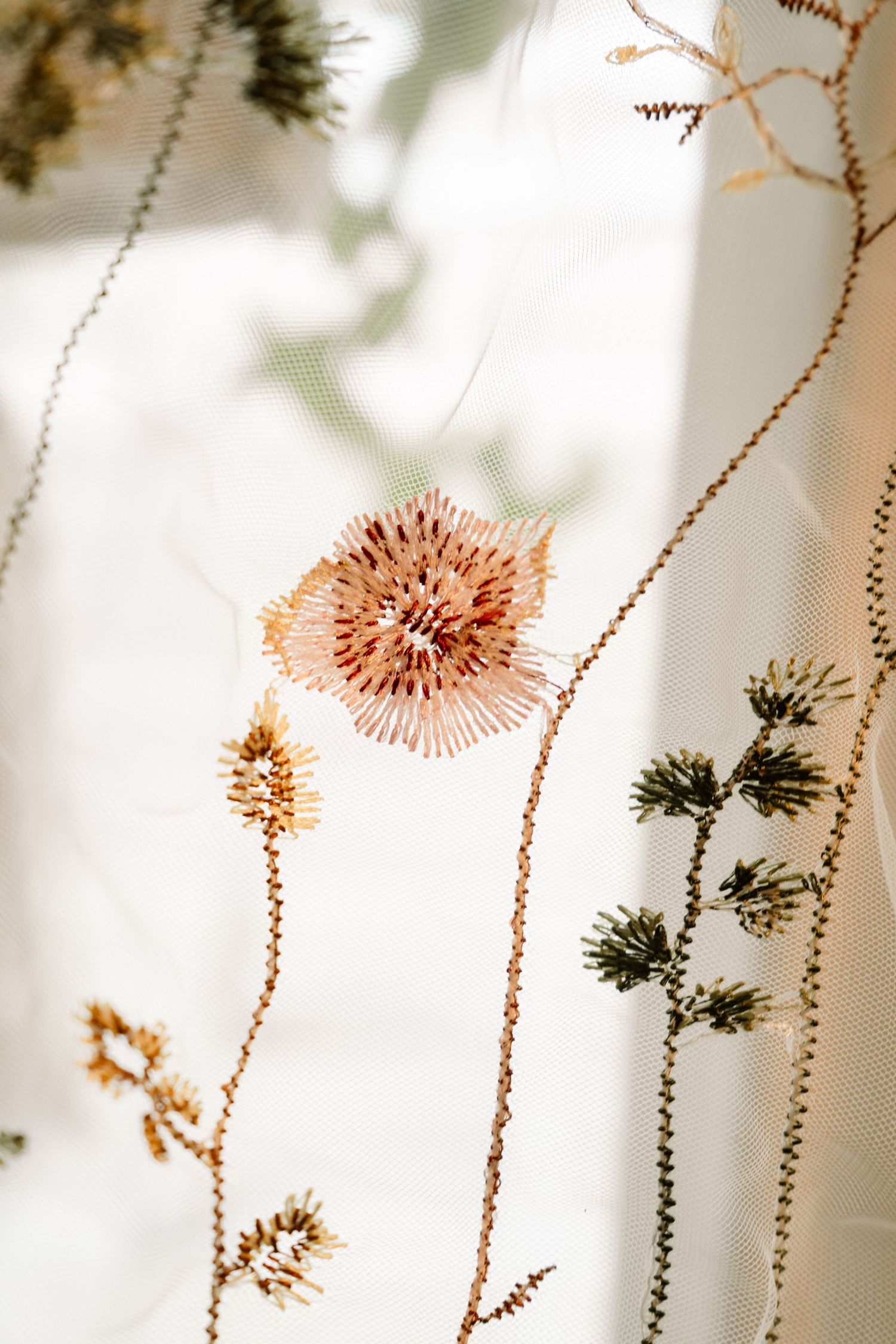 ©AnnaVonRiesenPhotography Wedding Photography | Color image of a veil detail.