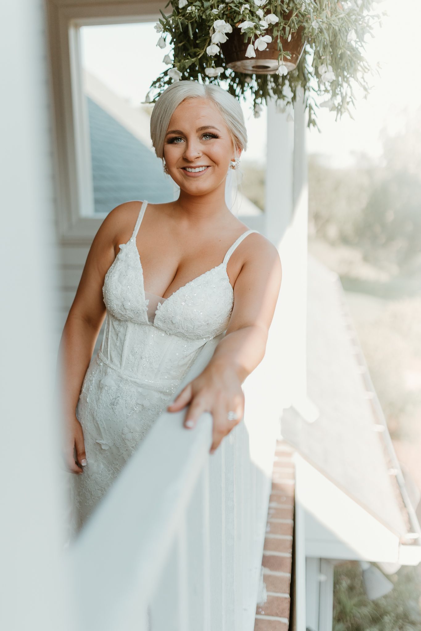 Series of bridal portraits showing off a beautiful white lace wedding dress.