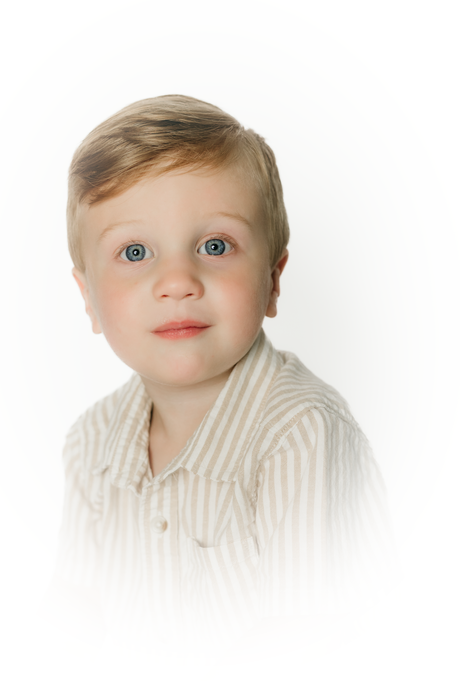 Close-up portrait series of a young child in striped shirt against white background.