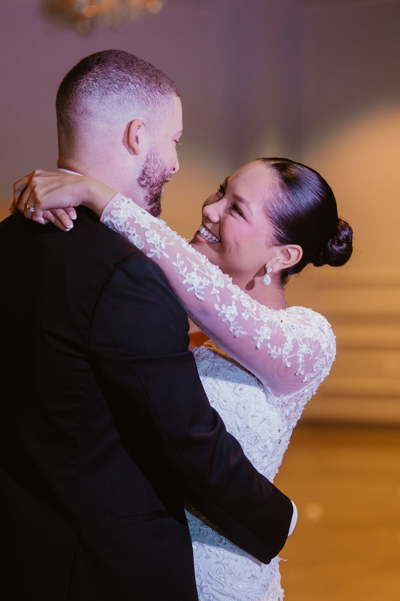 Romantic dance moment captured between newlyweds during their first dance.