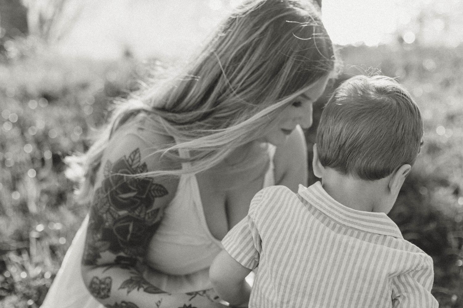 Sweet black and white portrait series capturing intimate family moments.
