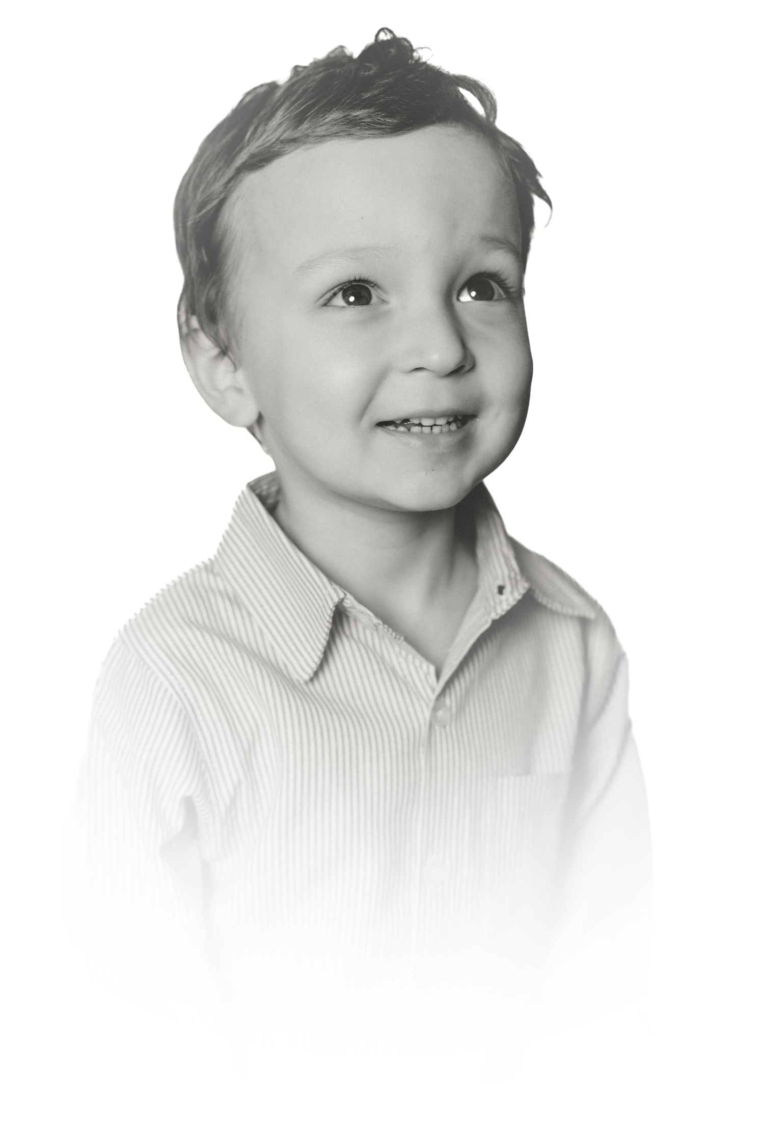 A series of high-key portraits showing a young child's joyful expressions.