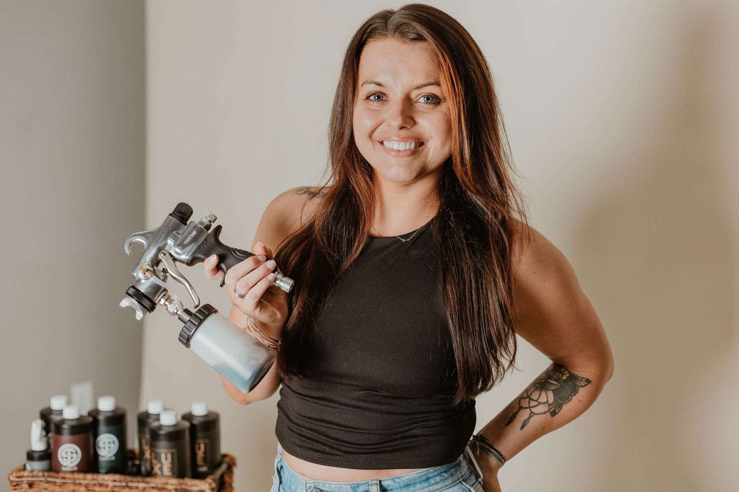 Lifestyle portraits with vintage cameras and photography equipment in studio setting.