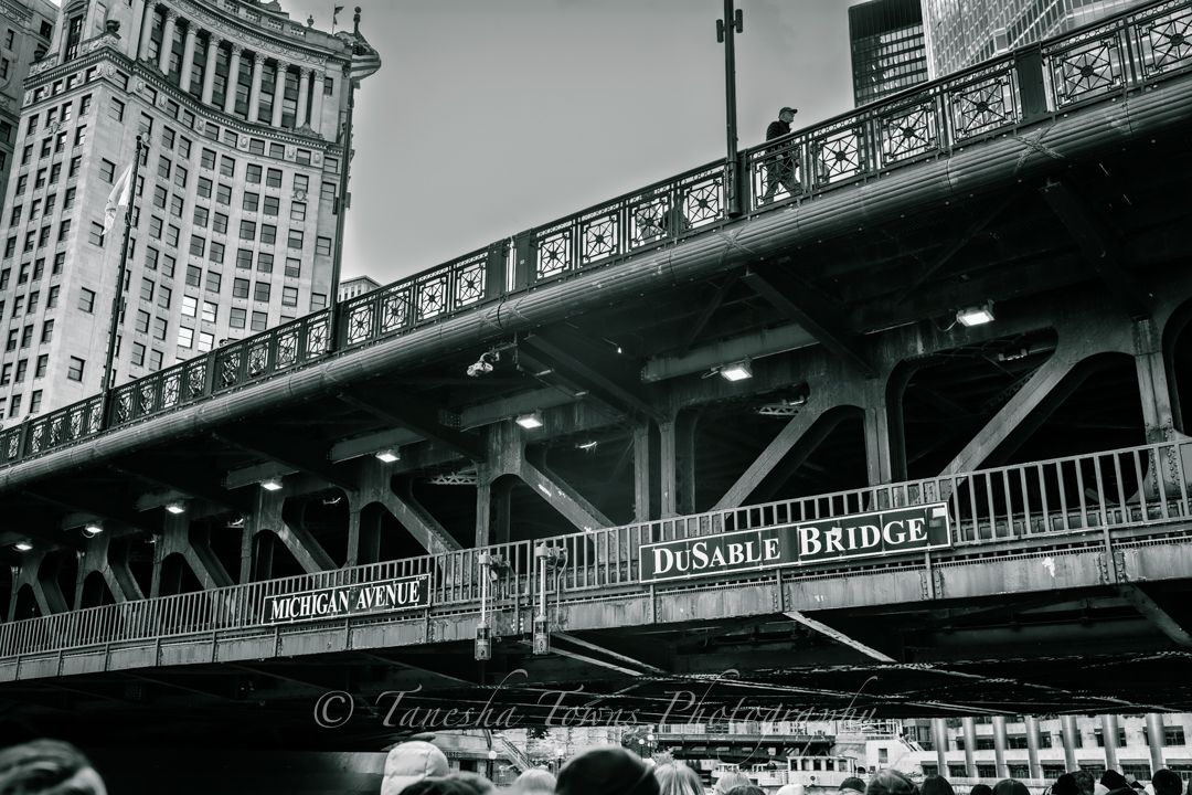 Black and white panoramic view of baseball stadium stands and architecture with vintage design elements.