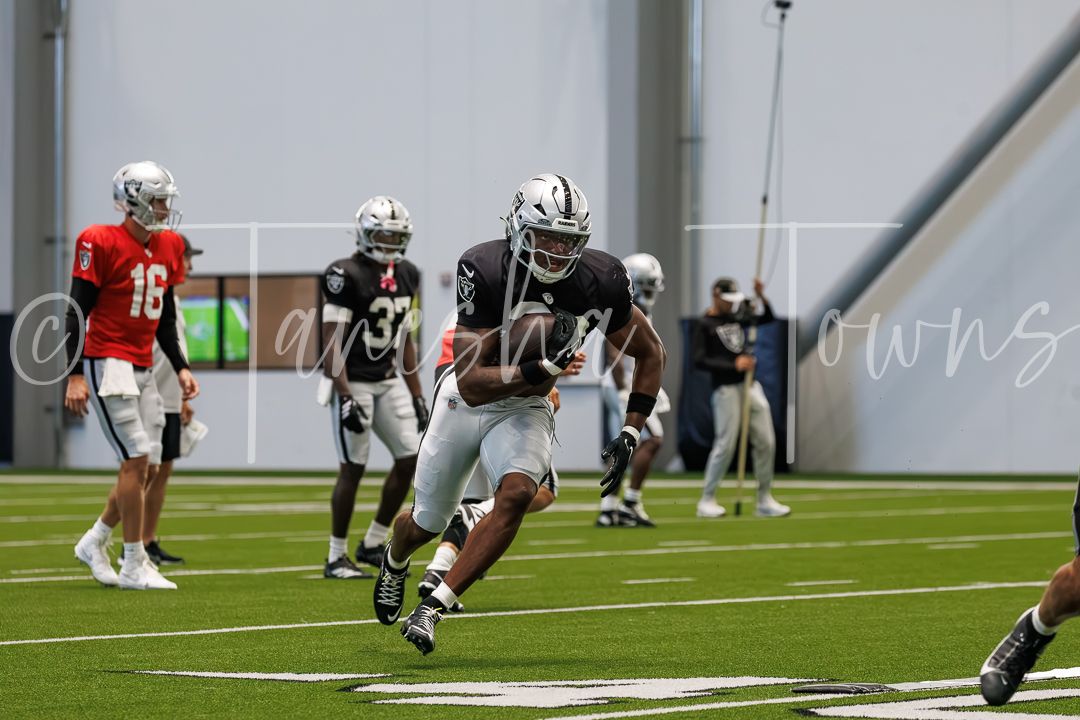 Las Vegas Raiders player runs a route during indoor practice at the Intermountain Health Performance Center.