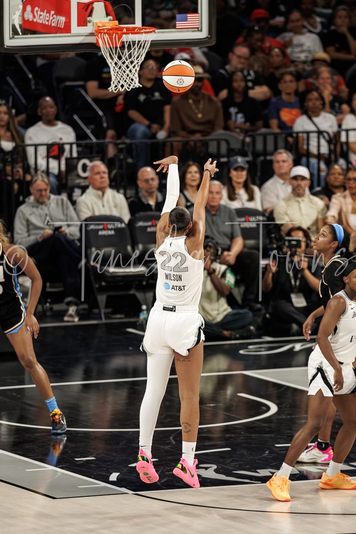 WNBA player A'ja Wilson #22 shoots a layup during a Las Vegas Aces game at Michelob Ultra Arena.