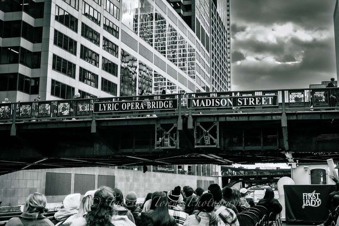 Dramatic panoramic view of Pike Place Market sign and buildings under moody cloudy skies in Seattle.