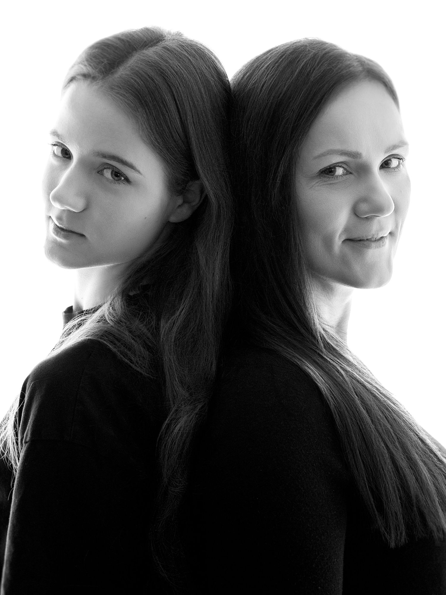 A black and white artistic portrait series showing different angles of long dark hair against a light background.