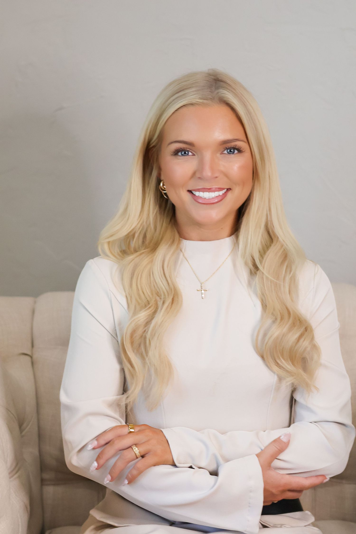 Series of casual portrait shots showing person in white sweater against neutral background.