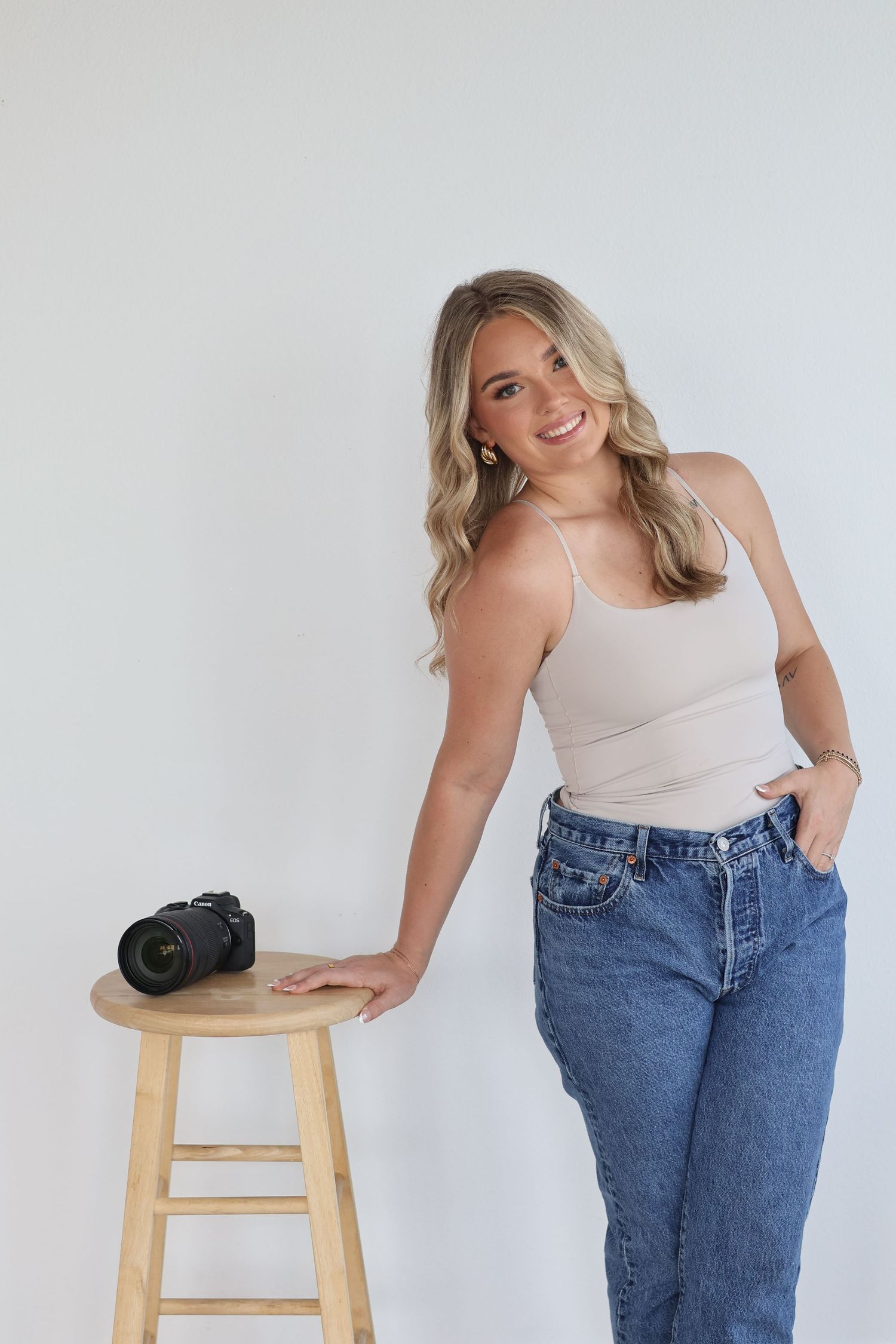 A before and after weight loss transformation showing the same jeans in multiple progress photos against a white background.
