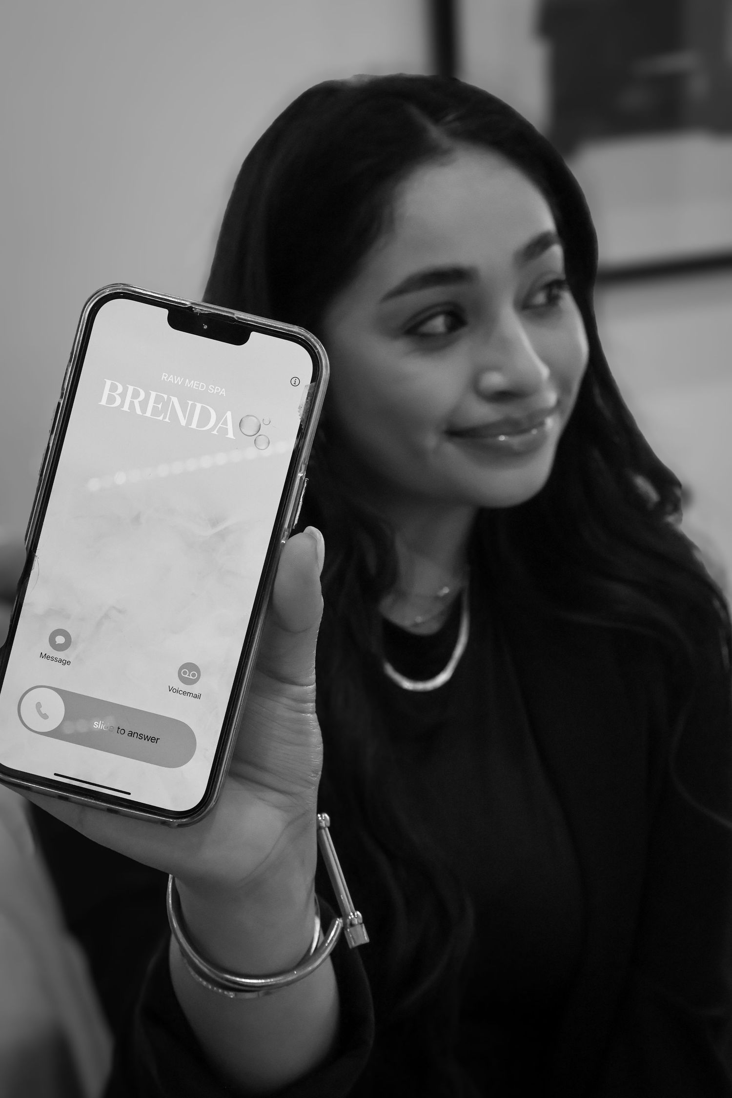 Series of photos showing mobile app interface demonstrations in black and white.
