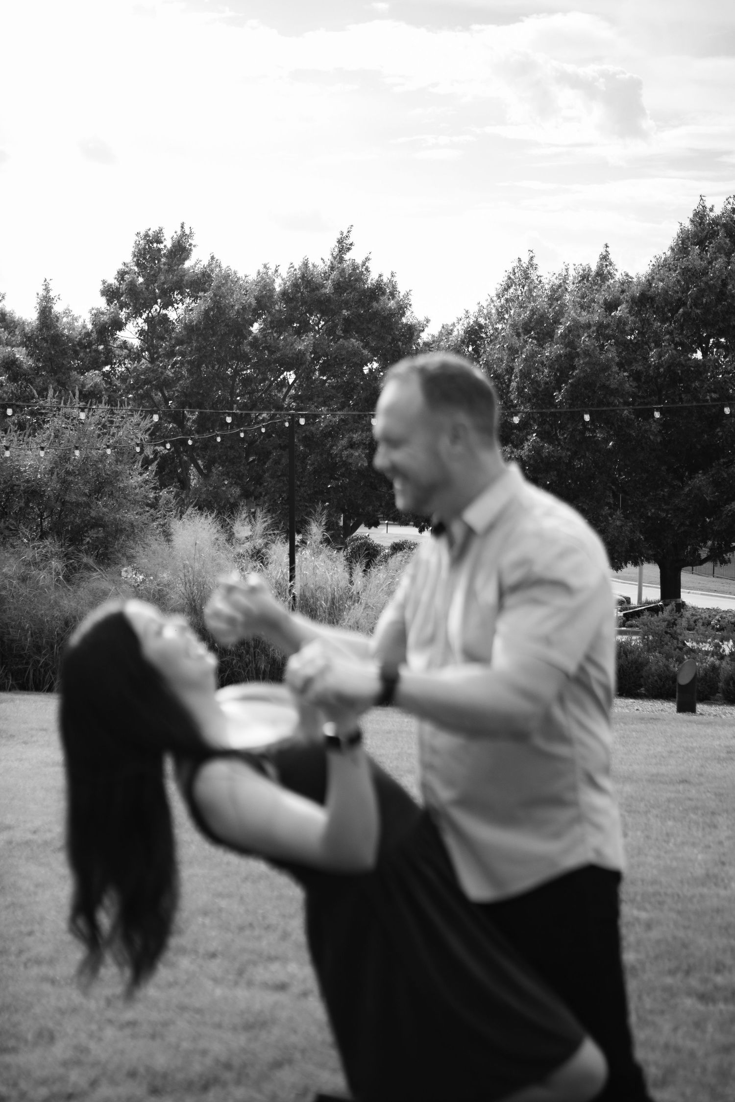 Man and woman dancing and laughing