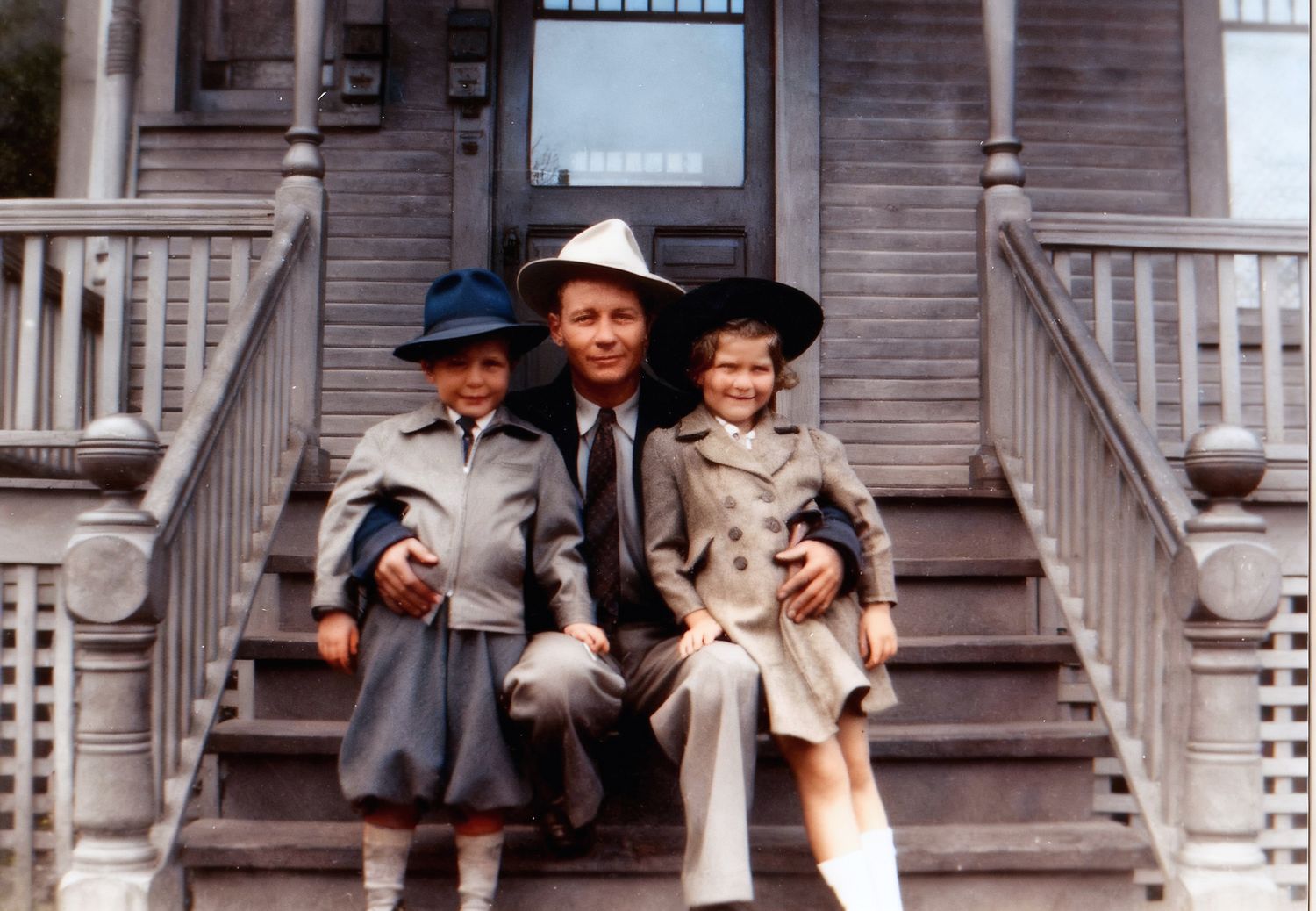 A vintage black and white photo sequence shows a couple on a porch in a playful flirting scene.