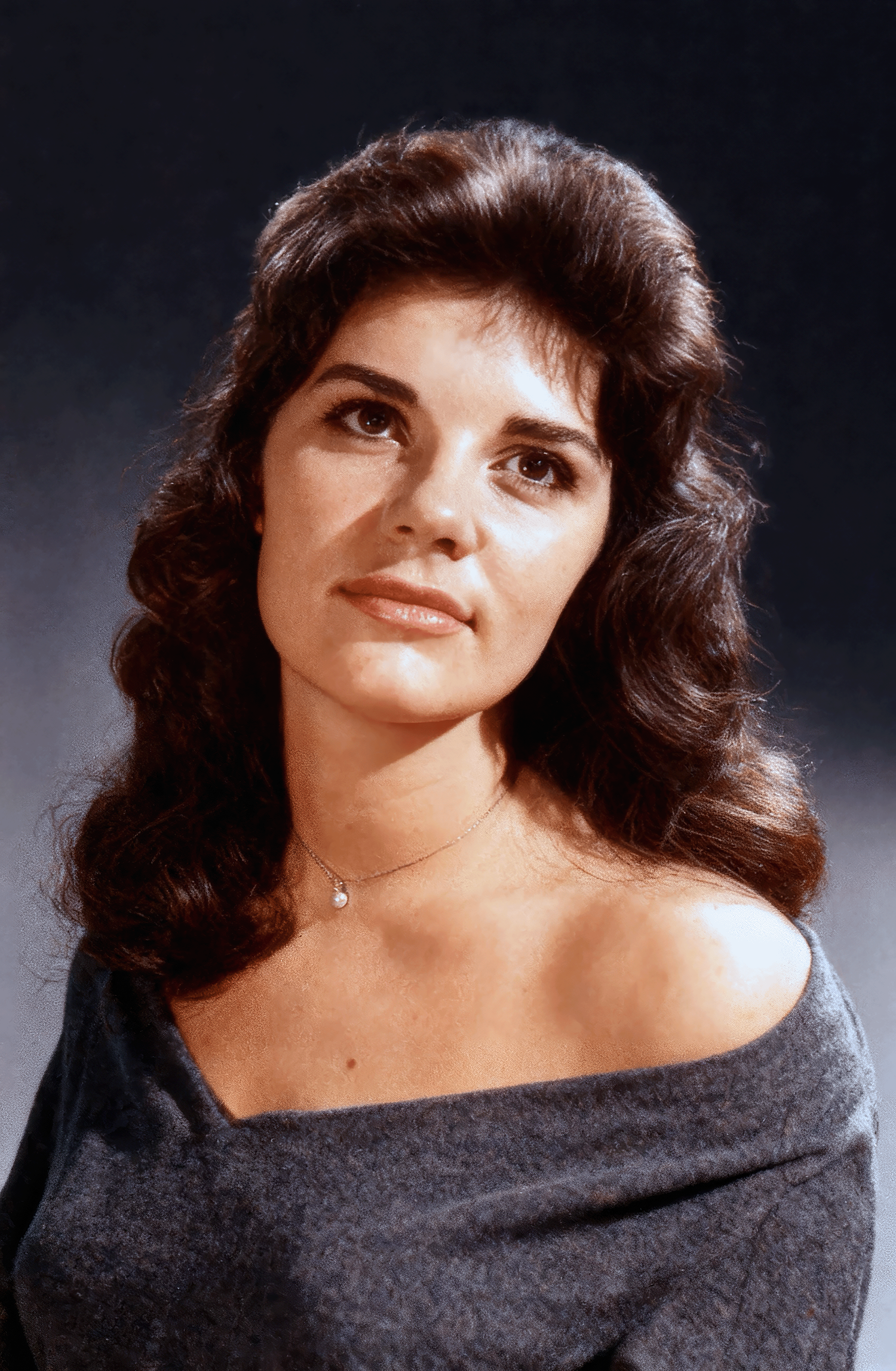 A vintage glamour portrait series showing a person with dark hair wearing an off-shoulder sweater in dramatic lighting.