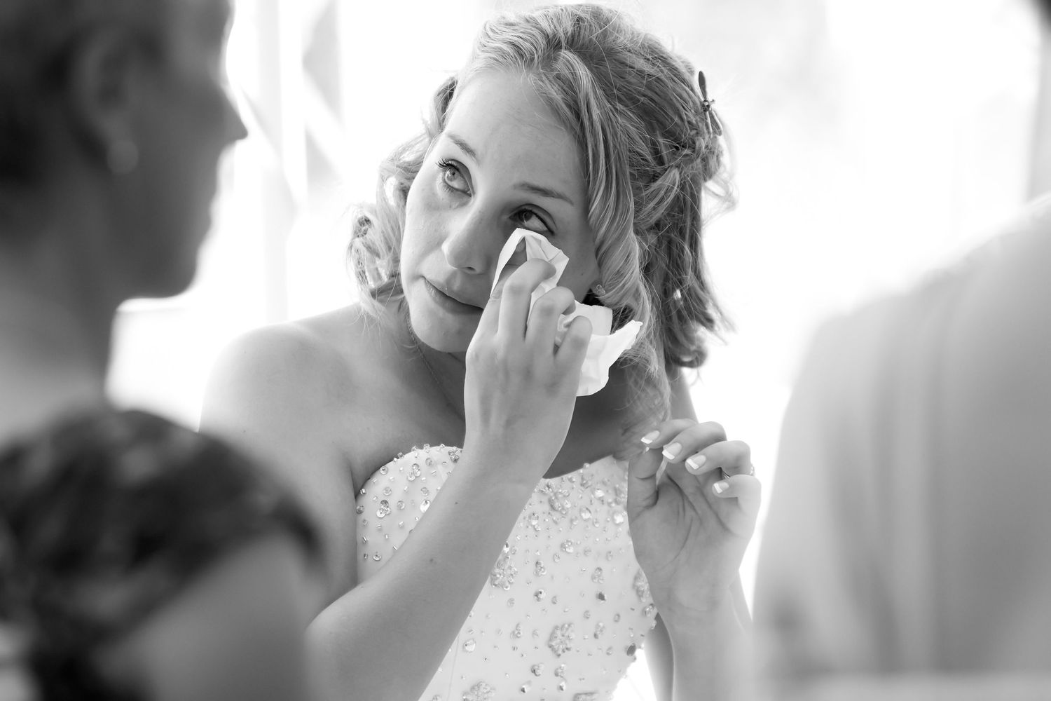 Surrey wedding documentary photography of guests laughing during dinner