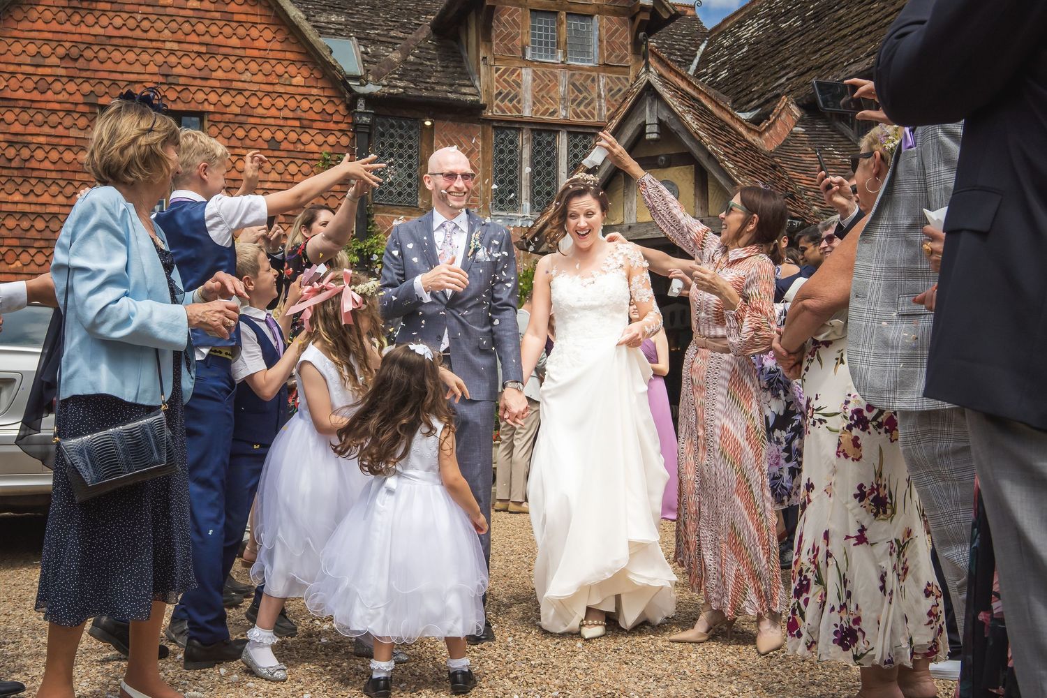 Documentary wedding photography of first kiss in a Surrey church