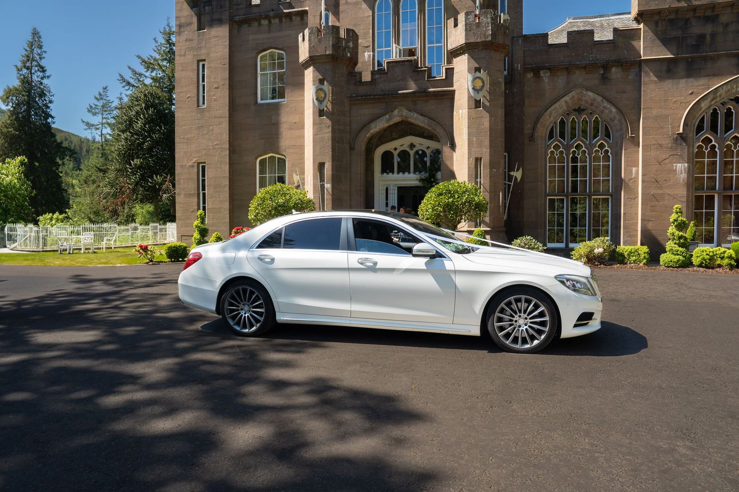 white Mercedes wedding car at balbirnie castle