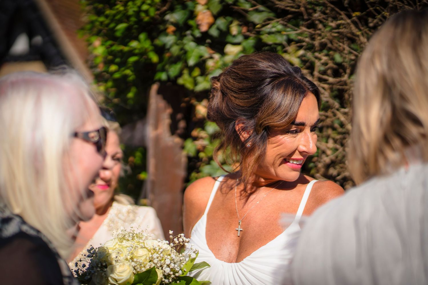 A portrait of a beautiful lady whilst chatting with guests at a family event in Margate.