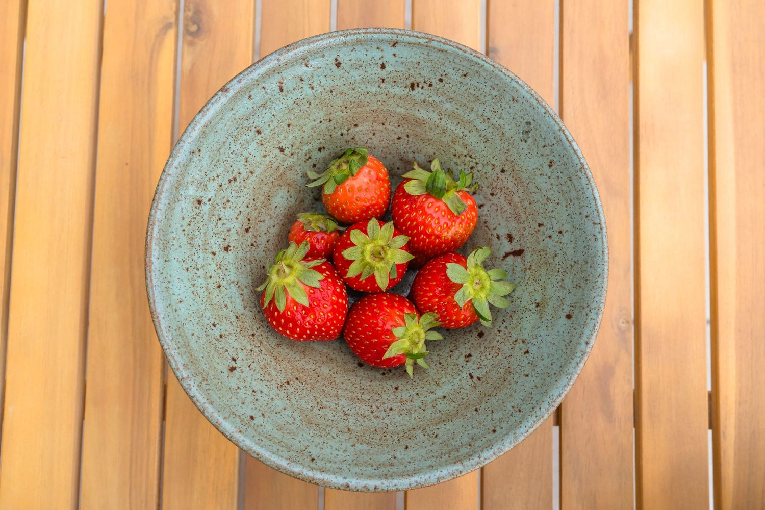 Beautiful hand made speckle bowls filled with lovely fresh fruit and cereals to show how they would look on your table. lifestyle session