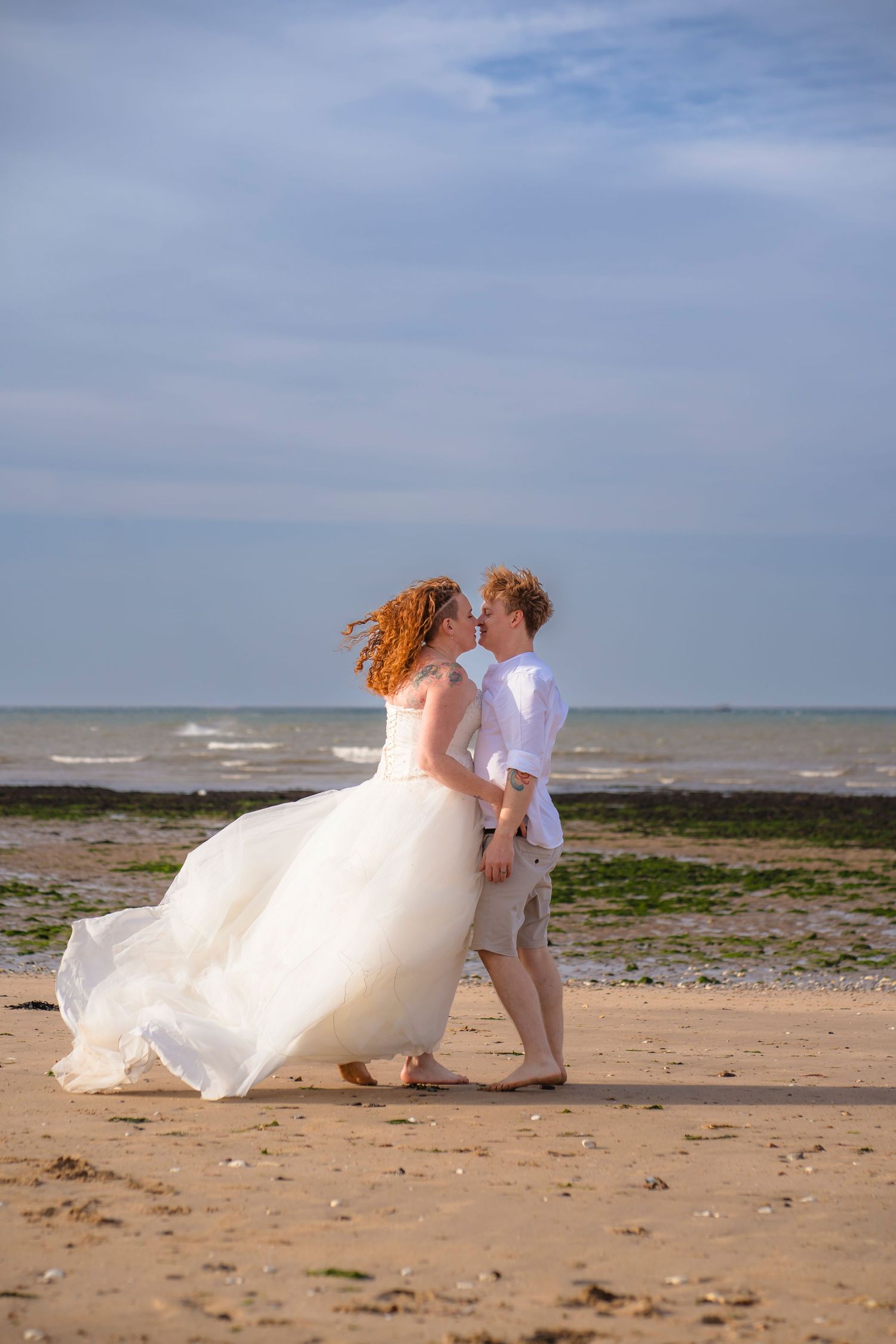 Couple on the beach at a family wreck the dress photo session on Westbrook Beach with Shorely a memory photography, Kent.