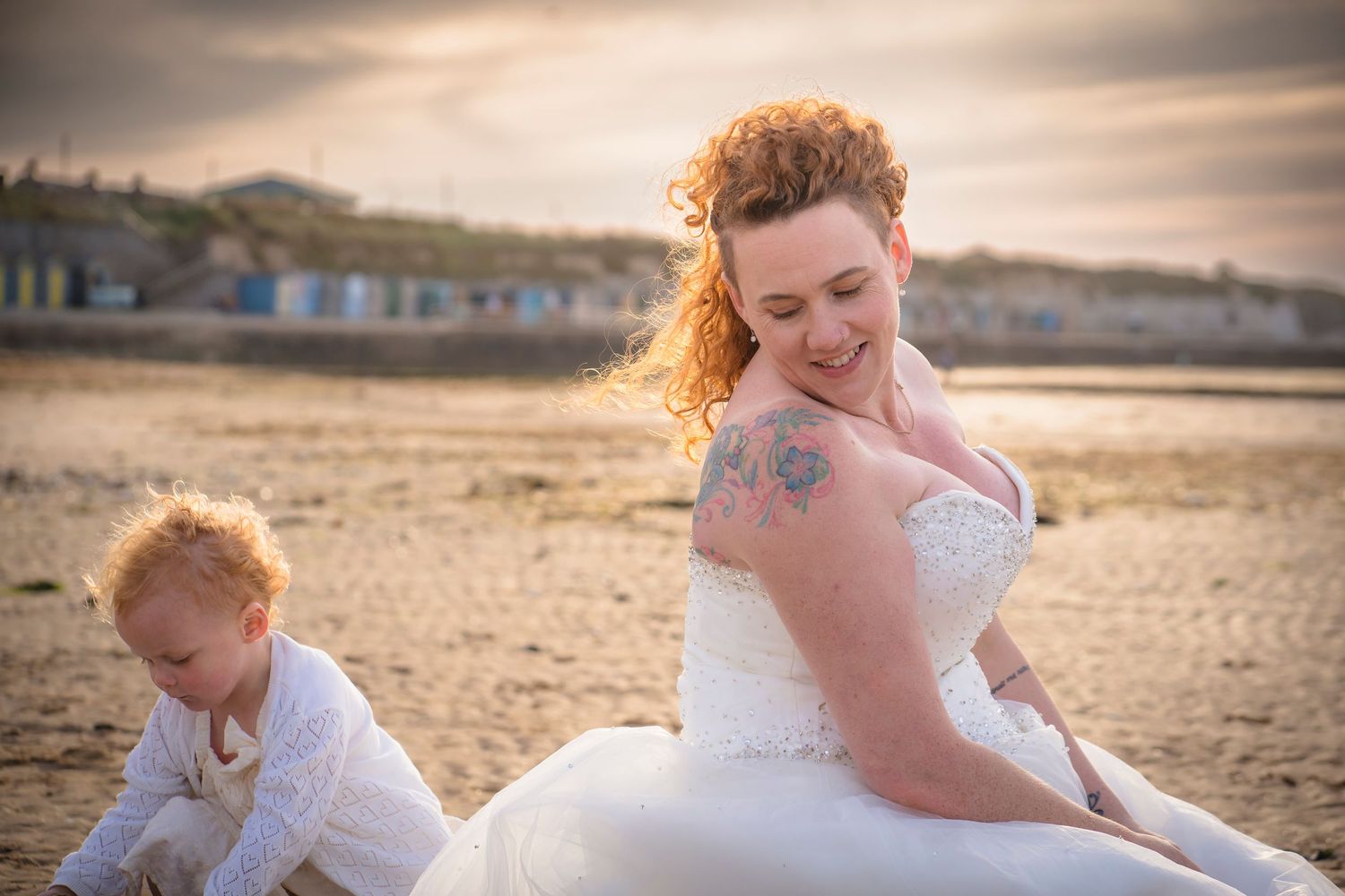 A mother and daughter on Westbrook beach during a family photo session.