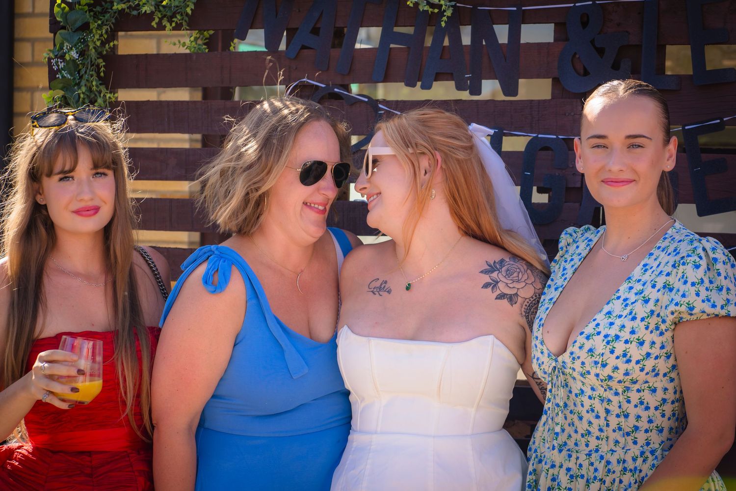 Family hugs at a celebration gathering, candid and unposed, real emotions from shorely a memory photography.